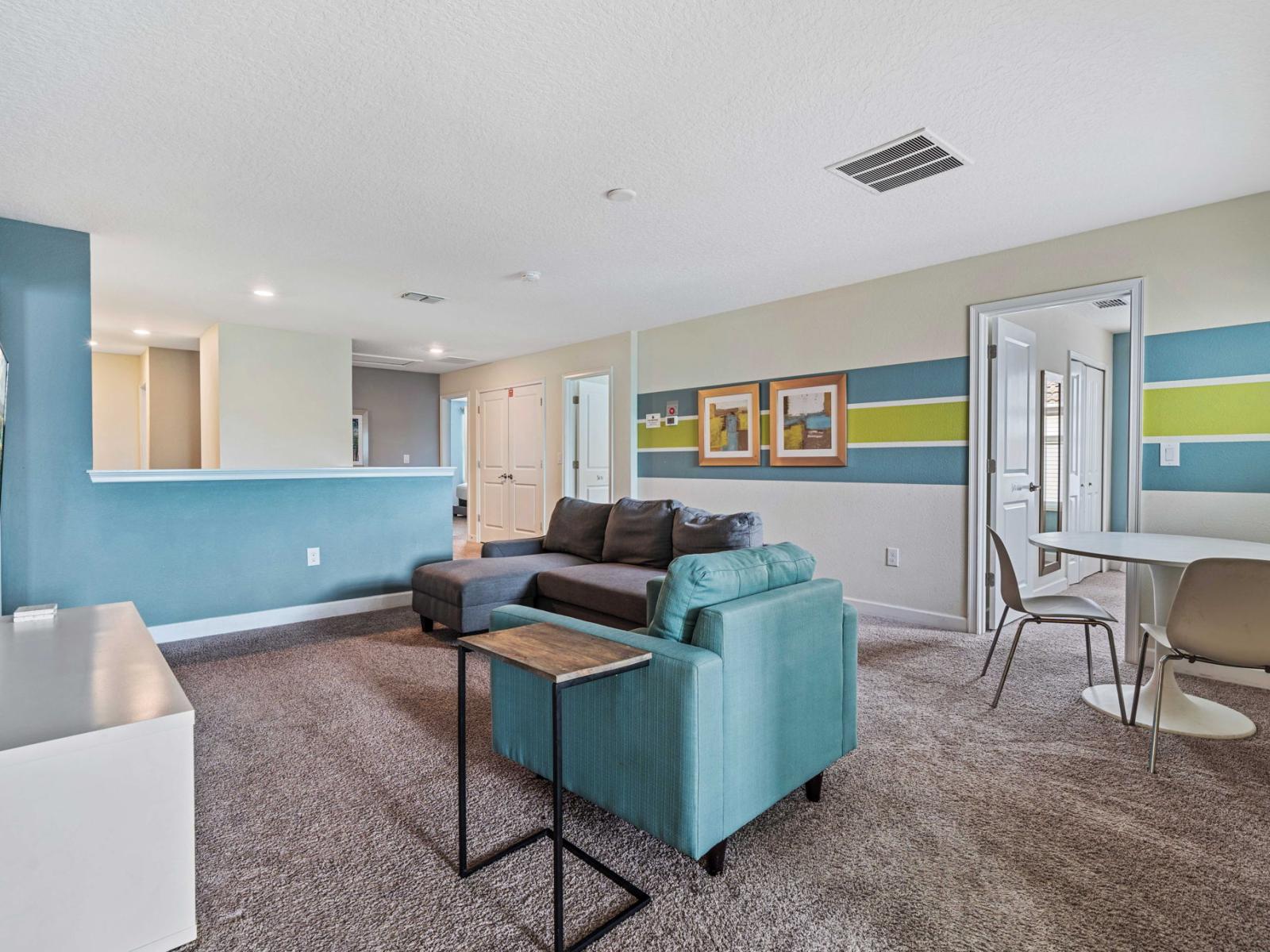 - The loft area is both inviting and stylish, with plush seating that encourages relaxation and socializing - Smart TV to watch your favorite shows and movies with loved ones - Functional layout includes a small dining area and an entertainment setup