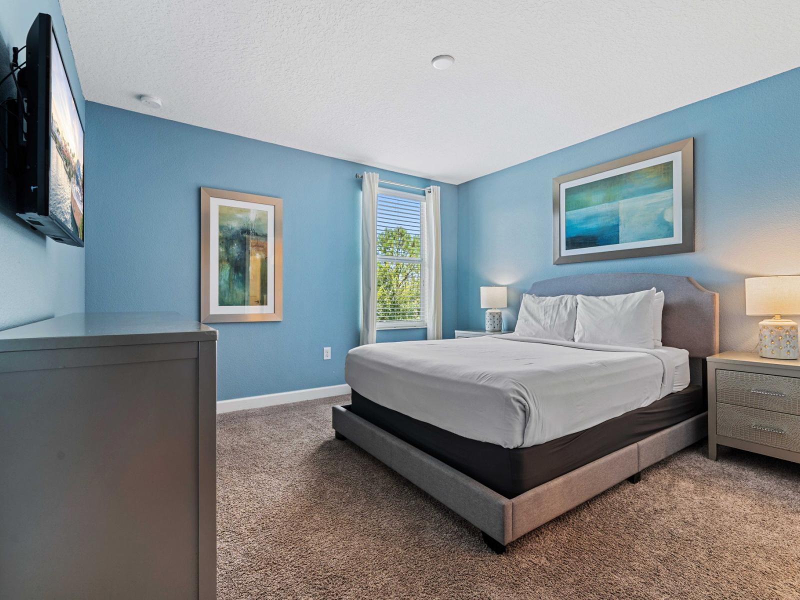 - Stay in the charming bedroom with a queen-sized bed, smart TV and elegant furnishings - Soft carpeting and a soothing color scheme for a restful night's sleep - Dual windows providing enhanced natural lighting and a pleasant view