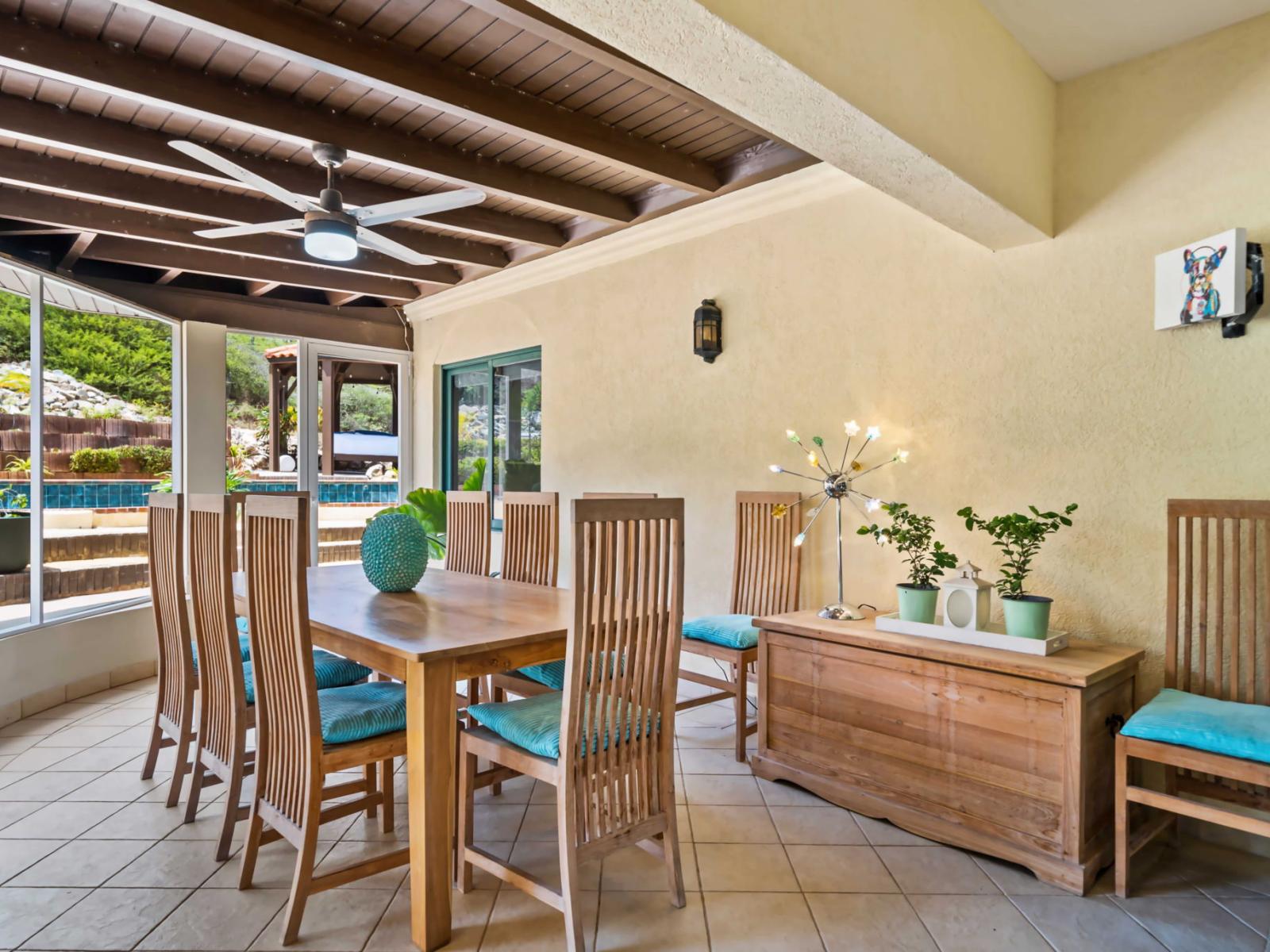 Second dining table A versatile space that adds an extra touch of peace to your stay, making every meal a special occasion - Surrounded by lush greenery and the serene ambiance of the outdoors - Perfect for meals with family, offering a blend of comfort an