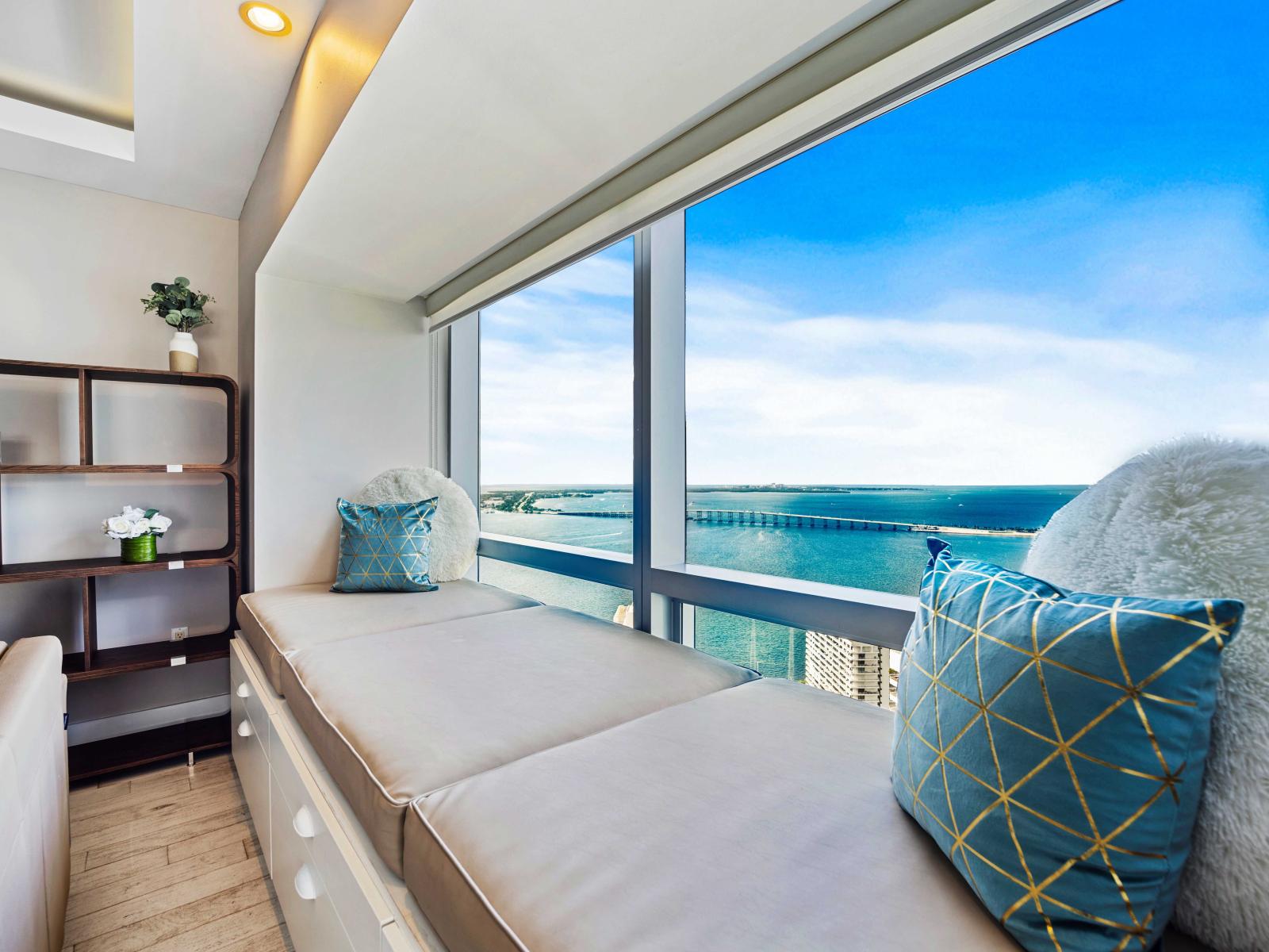 - Cozy window seating area with plush cushions perfect for simply taking in the views - Stunning ocean views from the living space offering a serene experience - Elegant decor create a relaxing atmosphere ideal for unwinding after a  busy day