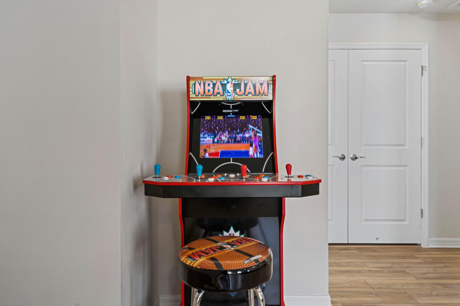 Loft area with arcade games, air hockey table and shuffle table board