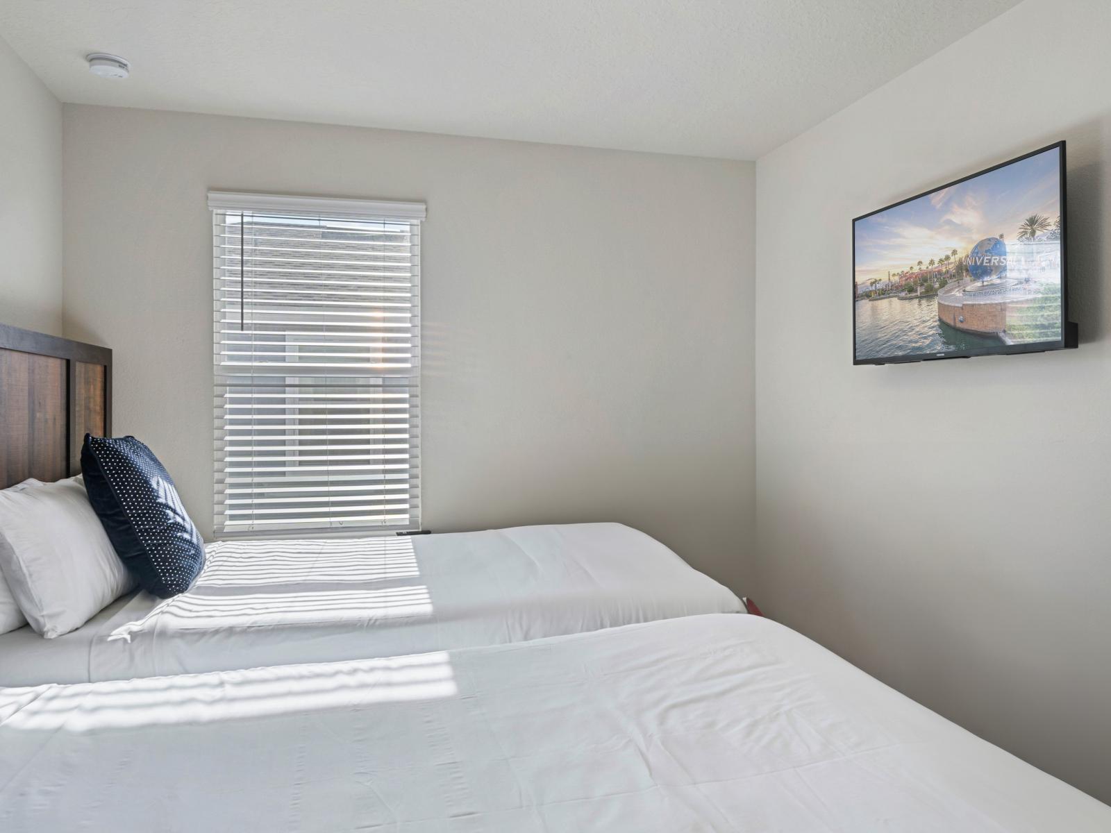 Bedroom 4 with 2 queen beds and a smart TV