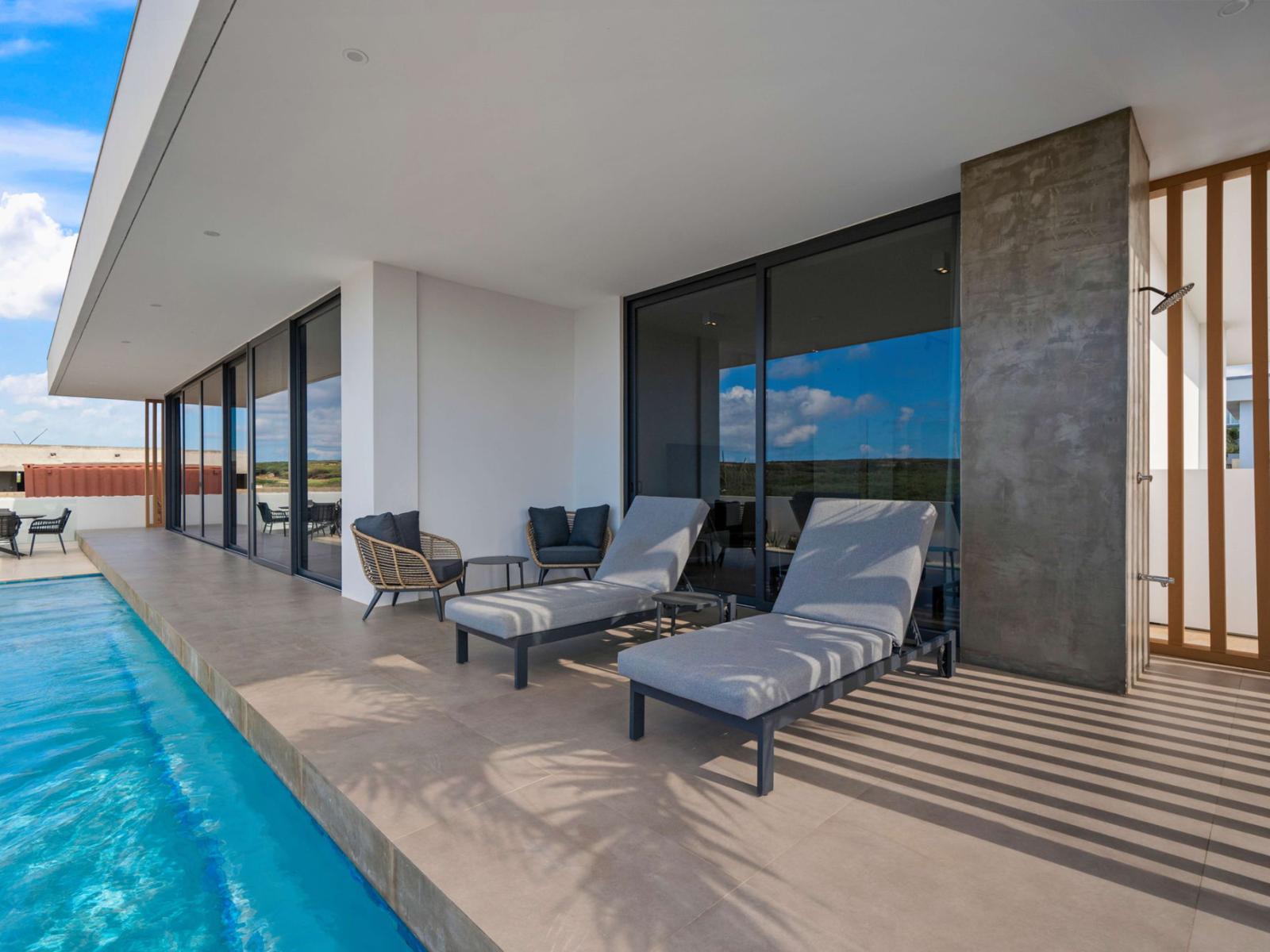 Savor the sunshine at the inviting private pool area