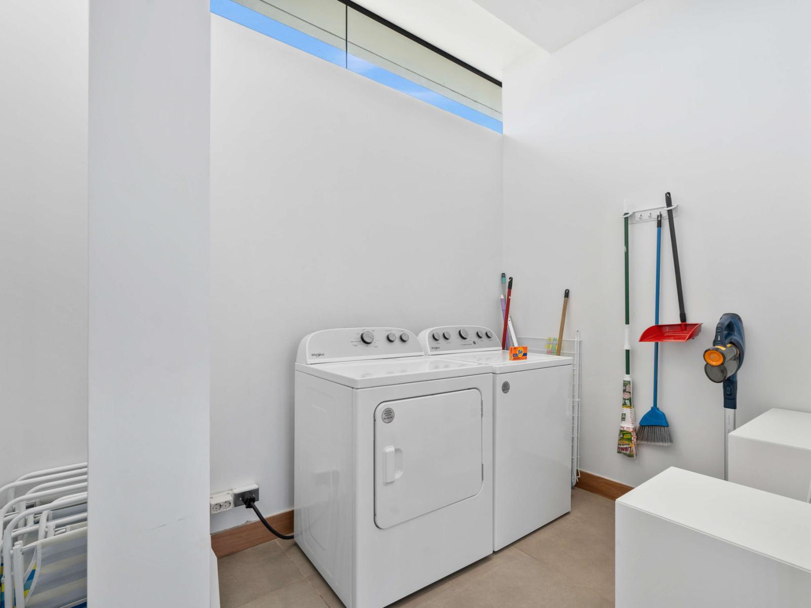 Laundry room with washer and dryer