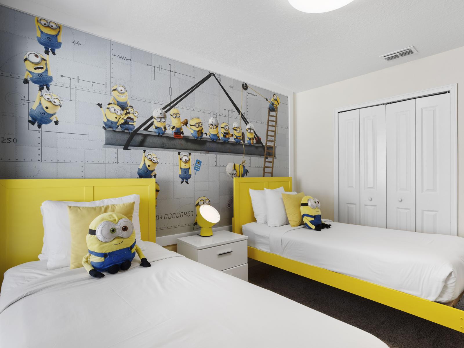 - Playful Minion-themed room with bold wall art and comfortable twin beds - Bright yellow accents create a lively and inviting space - Ideal spot for a fun-filled family vacation experience