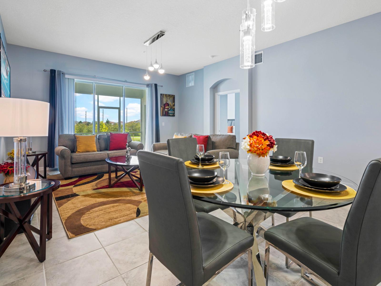 - Stylish dining area with seating for four, perfect for intimate meals or casual dining - A modern glass table and sleek chairs create a chic, contemporary vibe - Open layout allows easy access to the living room, making it ideal for entertaining