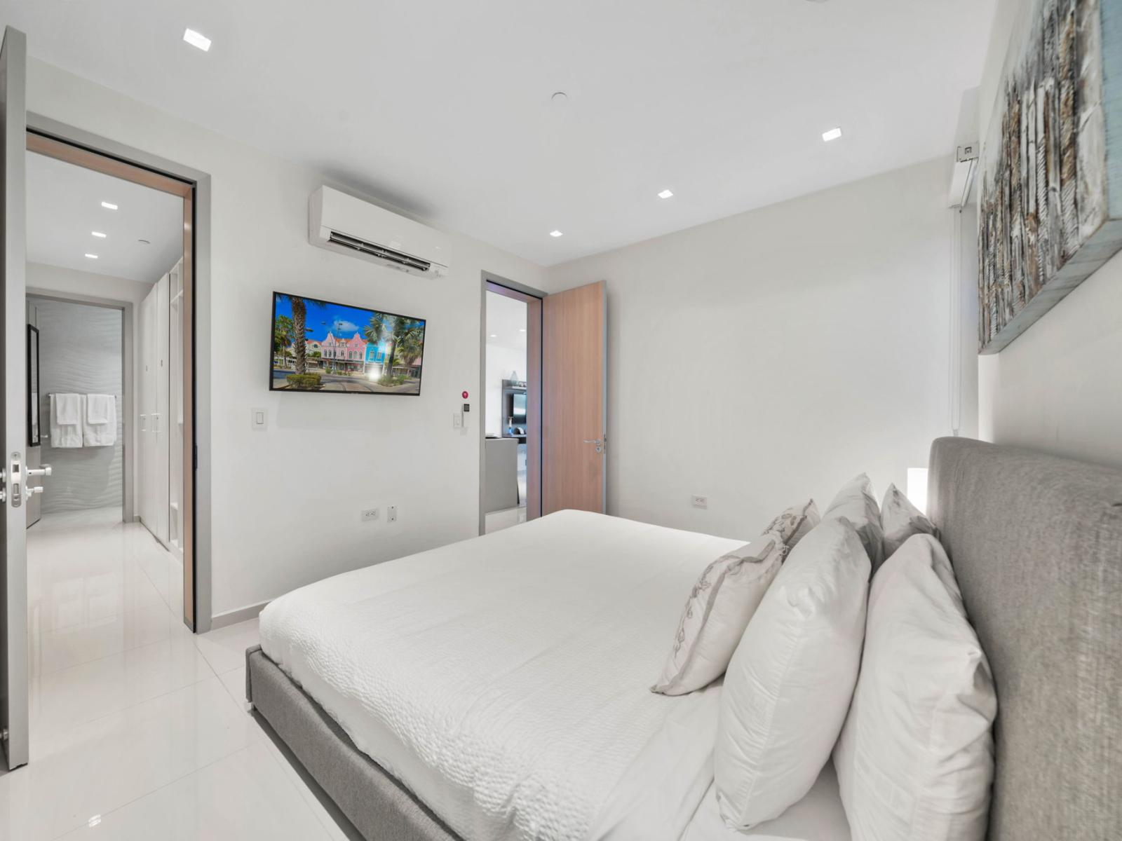 - Step inside this enchanting bedroom with a cozy double bed and calming, neutral tones - Ensuite bathroom and air conditioning for added comfort and privacy - An inviting retreat to recharge after a day of exploring