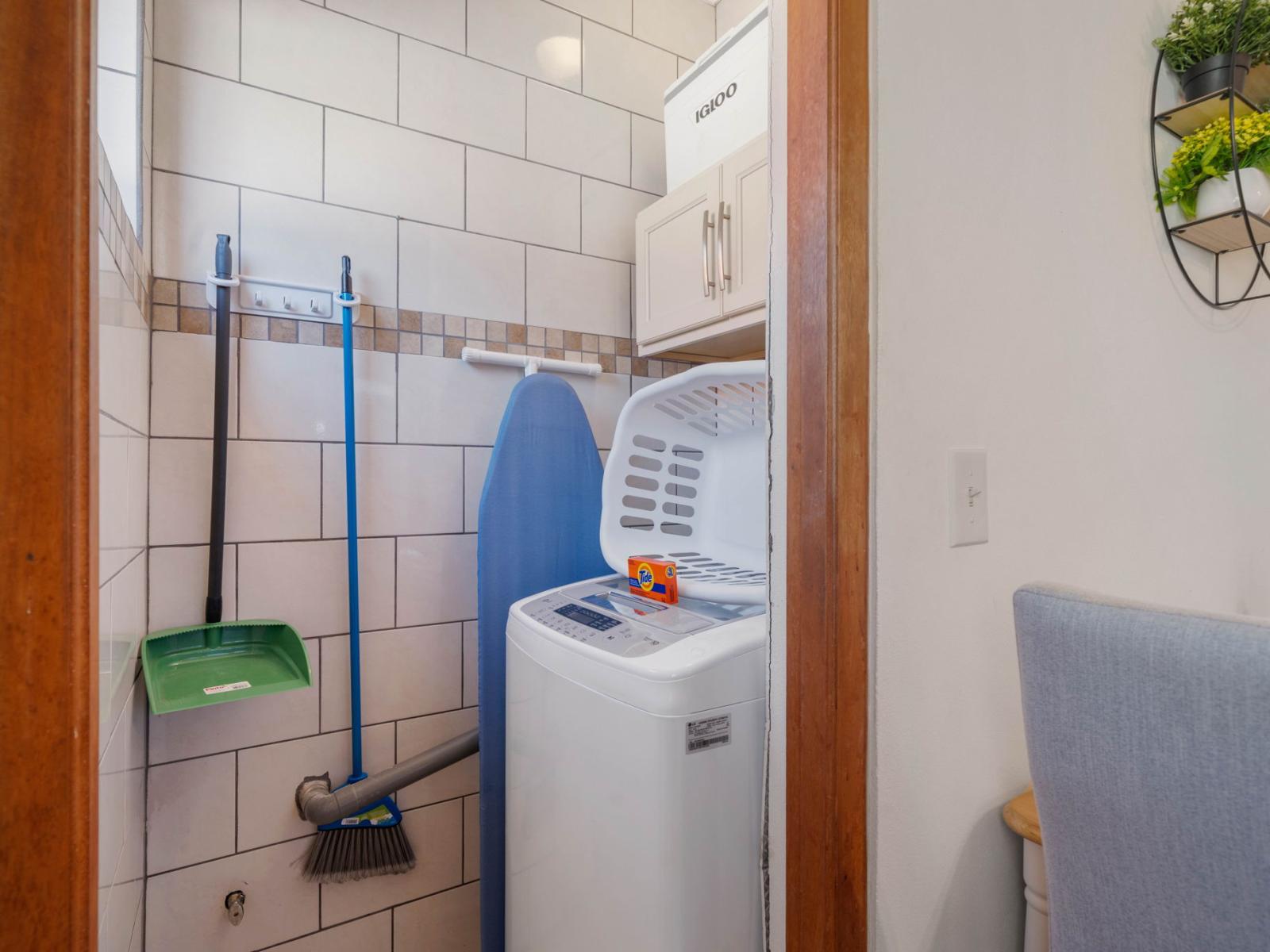 - Keep your wardrobe fresh and ready with a fully equipped in-home laundry space - Featuring a washing machine, ironing board, and all the essentials for hassle-free laundry - Perfect for long stays or spontaneous beach day cleanups