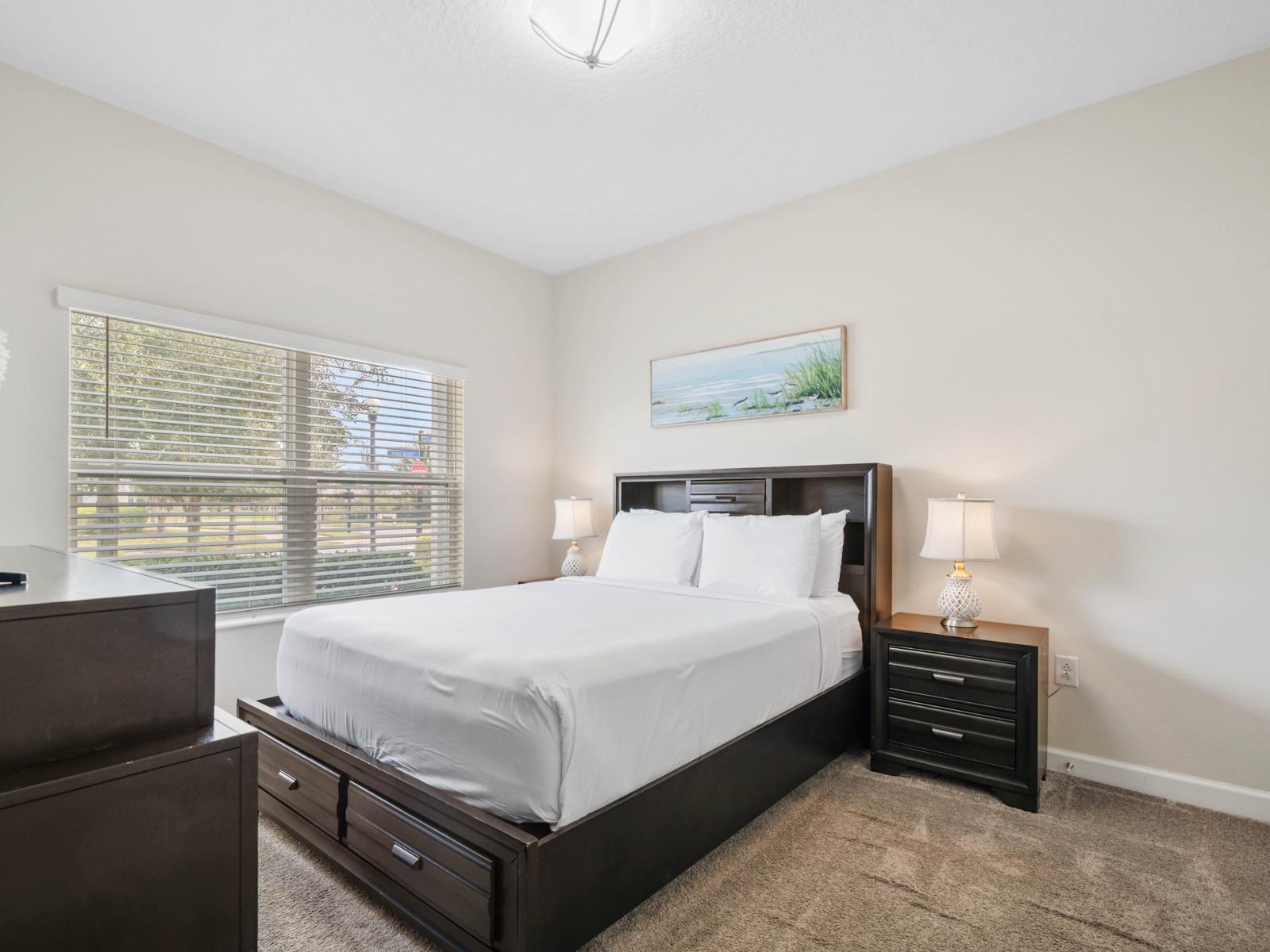 Your Private Retreat: Unwind in this tranquil bedroom featuring natural light, stylish furnishings, and a peaceful atmosphere.