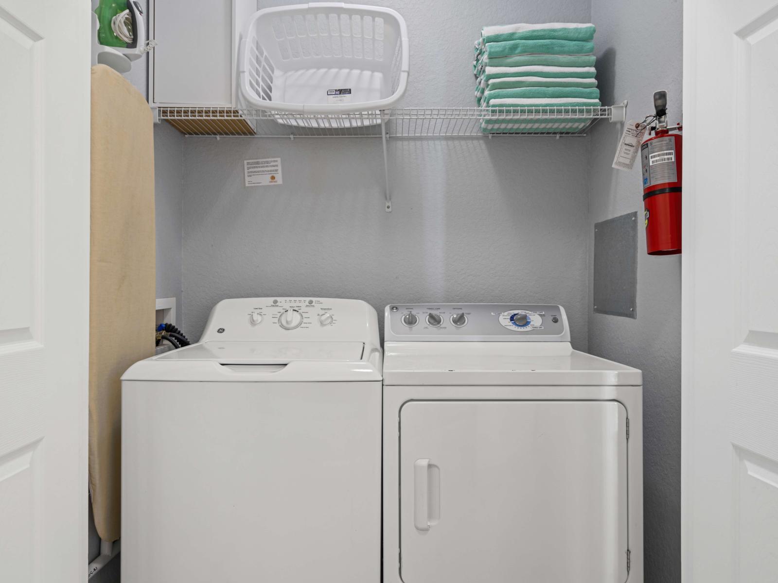 Convenient laundry room equipped with a washer, dryer, and storage essentials - Thoughtfully designed to make longer stays comfortable and hassle-free - A must-have feature for added convenience during your visit