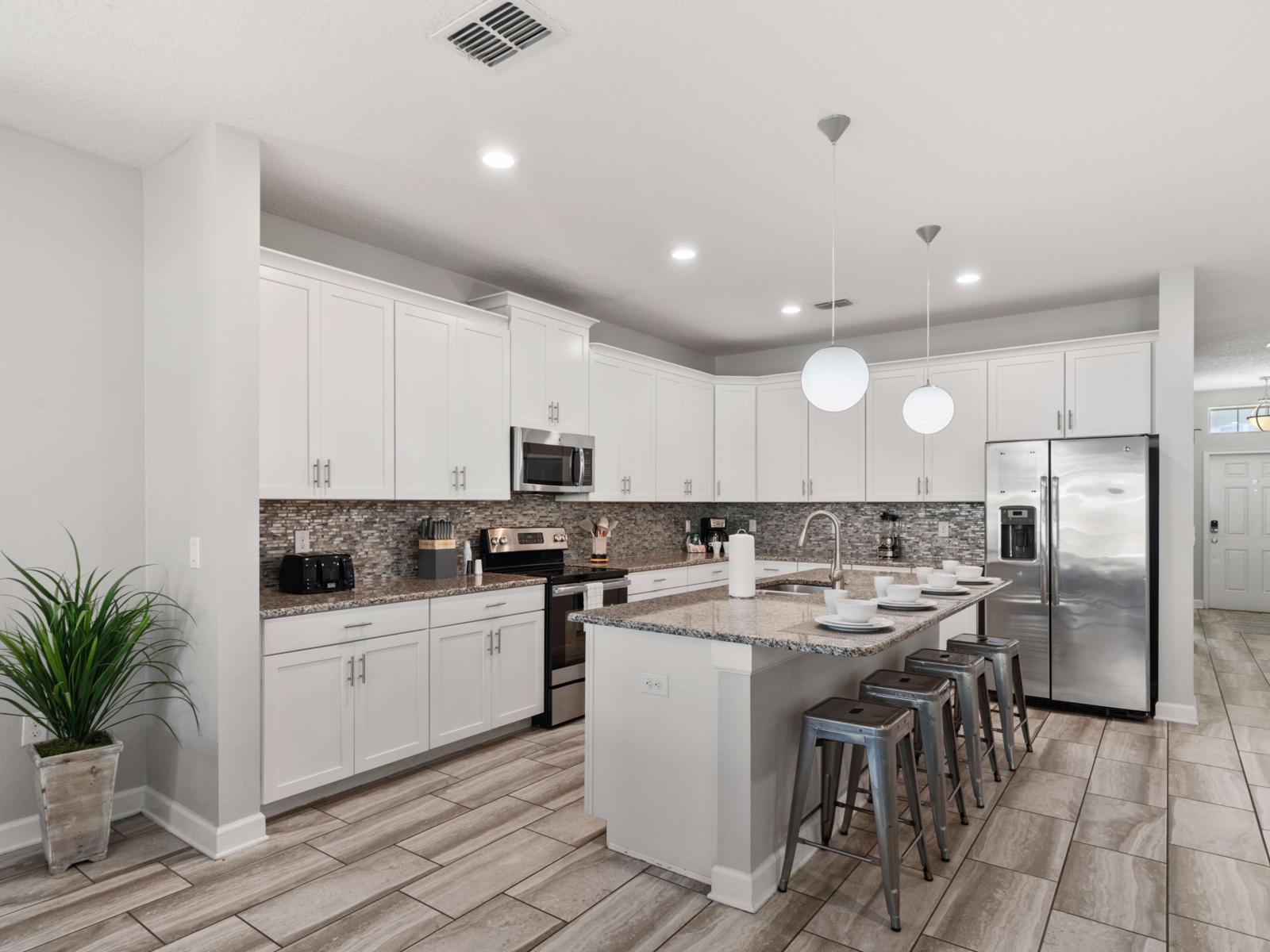 Cooking Amenities:  Fully equipped open kitchen with stainless steel appliances, large prep area, and everything you need to cook up meals for a crowd!