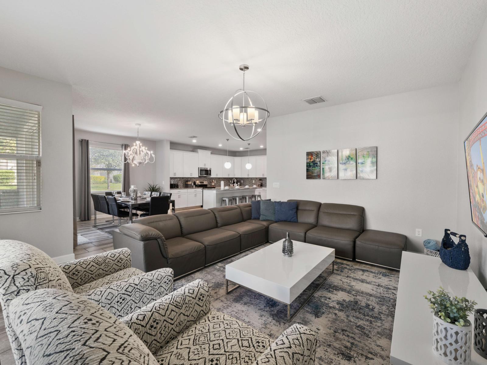 Entertainment Ready:  Enjoy movie nights or casual chats in this cozy living space, equipped with ample seating and a welcoming ambiance for family and friends.