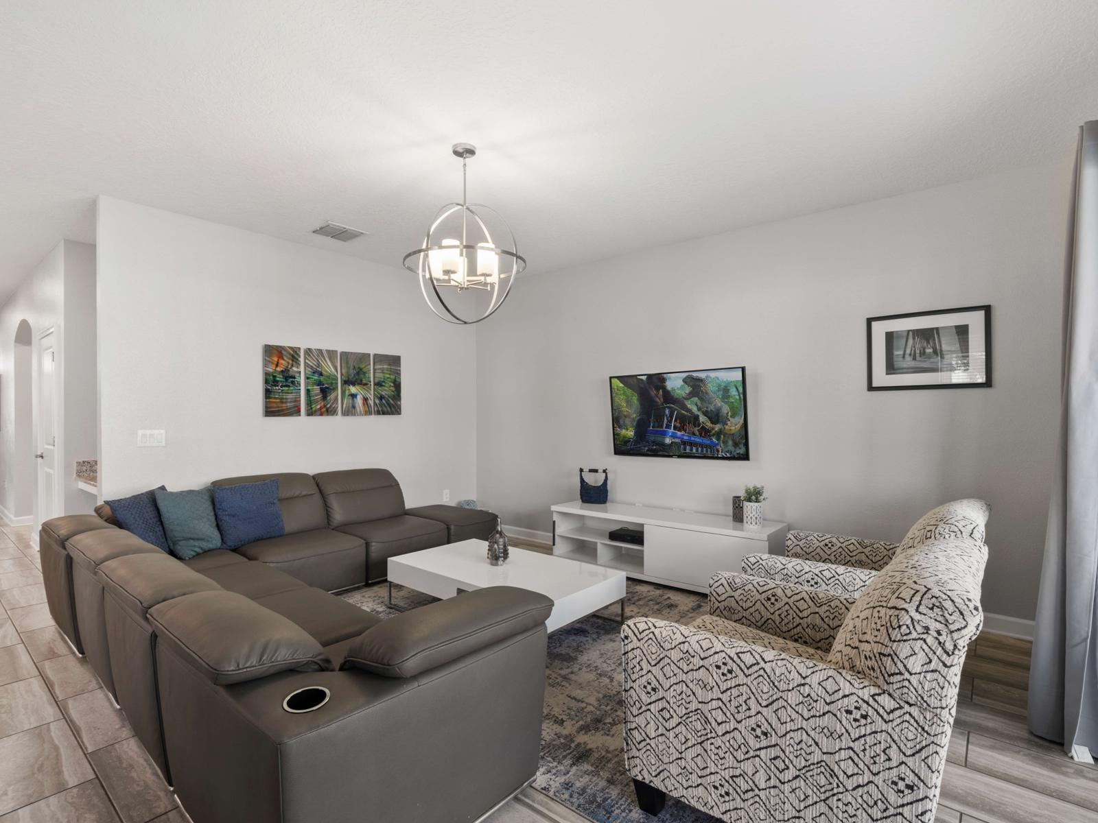 Entertainment Ready:  Enjoy movie nights or casual chats in this cozy living space, equipped with ample seating and a welcoming ambiance for family and friends.