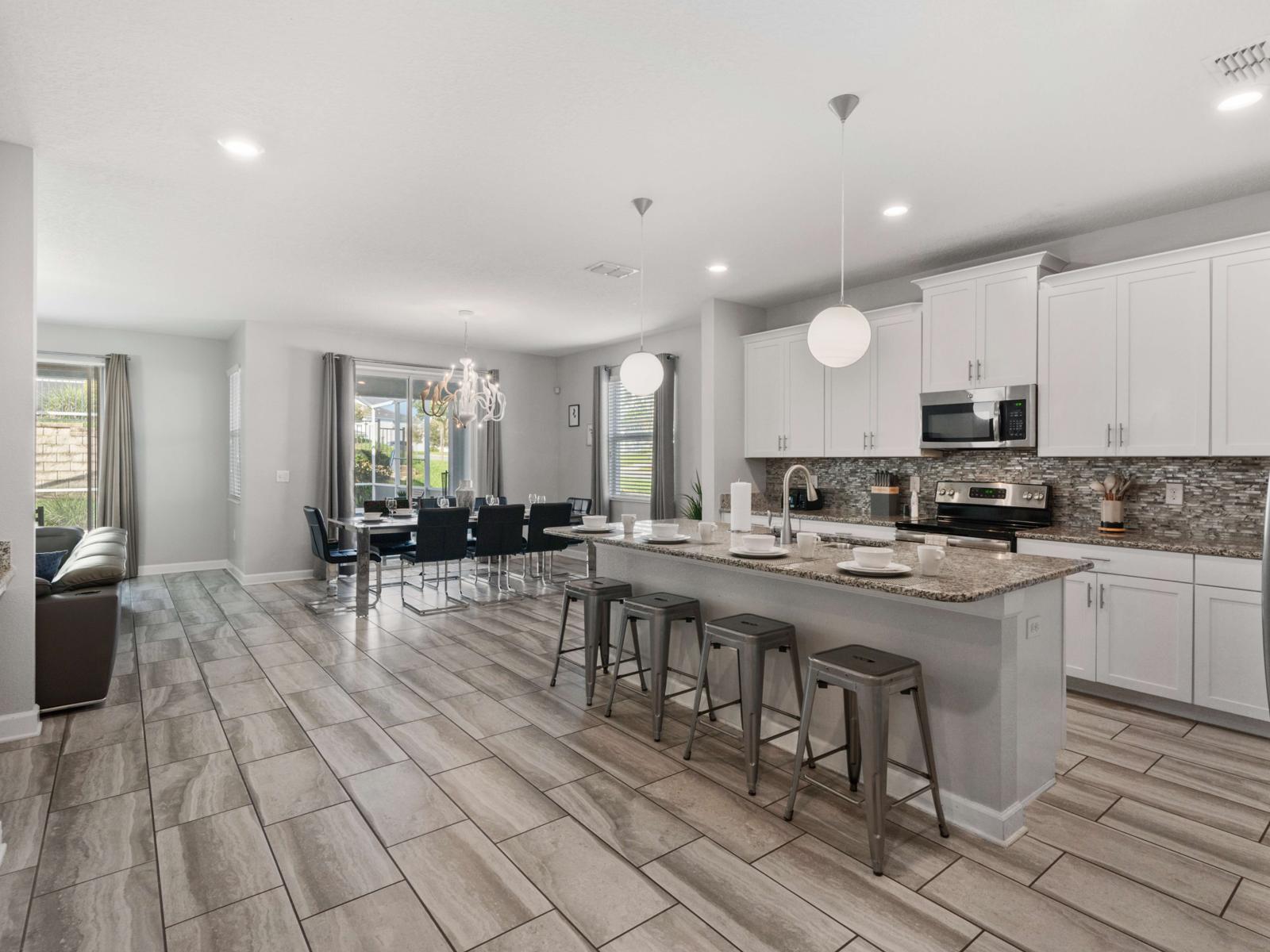 Cooking Amenities:  Fully equipped open kitchen with stainless steel appliances, large prep area, and everything you need to cook up meals for a crowd!