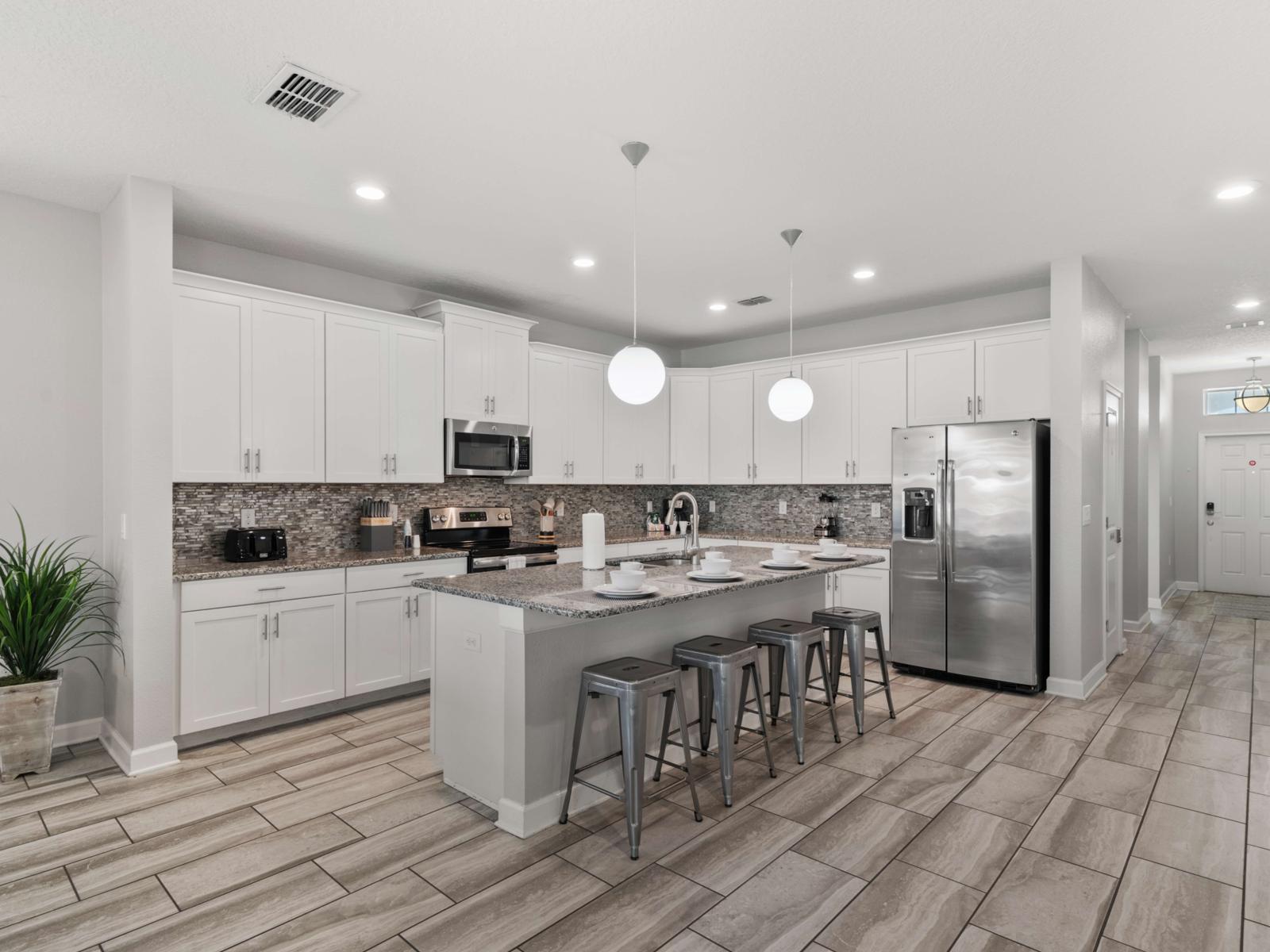 Cooking Amenities:  Fully equipped open kitchen with stainless steel appliances, large prep area, and everything you need to cook up meals for a crowd!