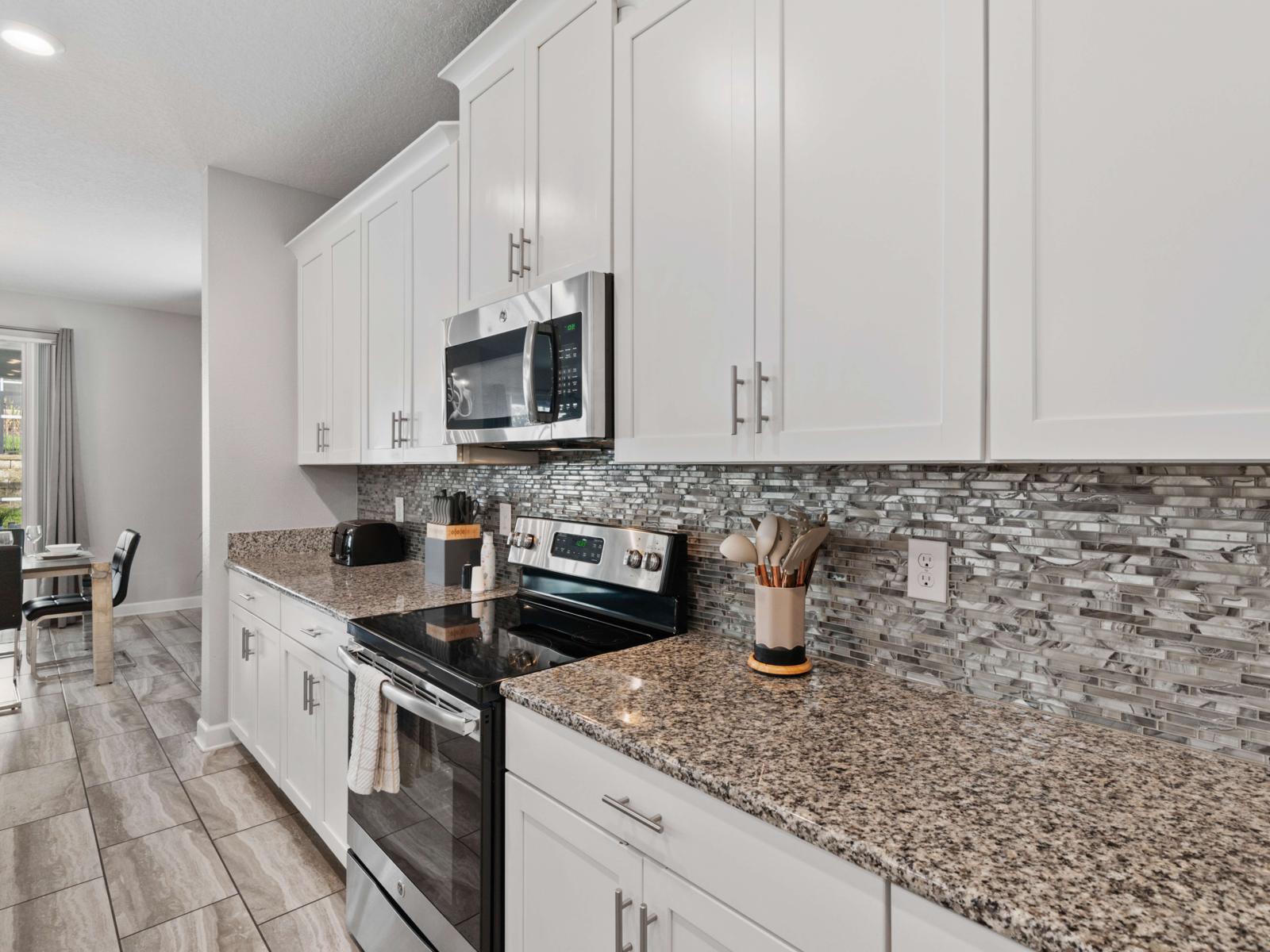 Cooking Amenities:  Fully equipped open kitchen with stainless steel appliances, large prep area, and everything you need to cook up meals for a crowd!