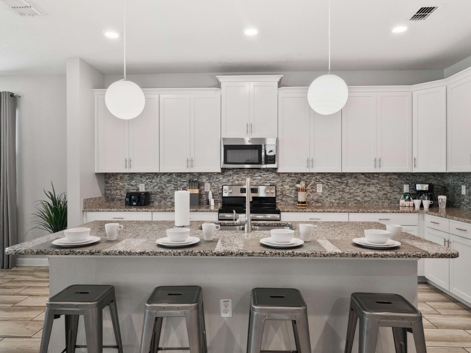 Cooking Amenities:  Fully equipped open kitchen with stainless steel appliances, large prep area, and everything you need to cook up meals for a crowd!