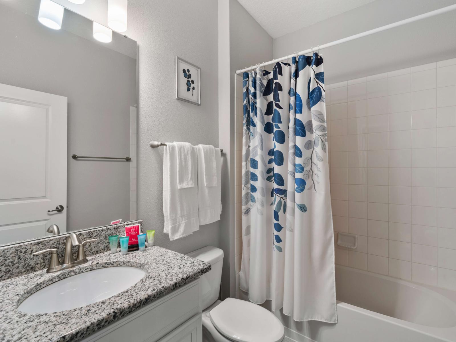 Bathroom Amenities:  Each bathroom in this spacious home includes walk-in showers, fresh towels, and thoughtful amenities to enhance your stay experience.