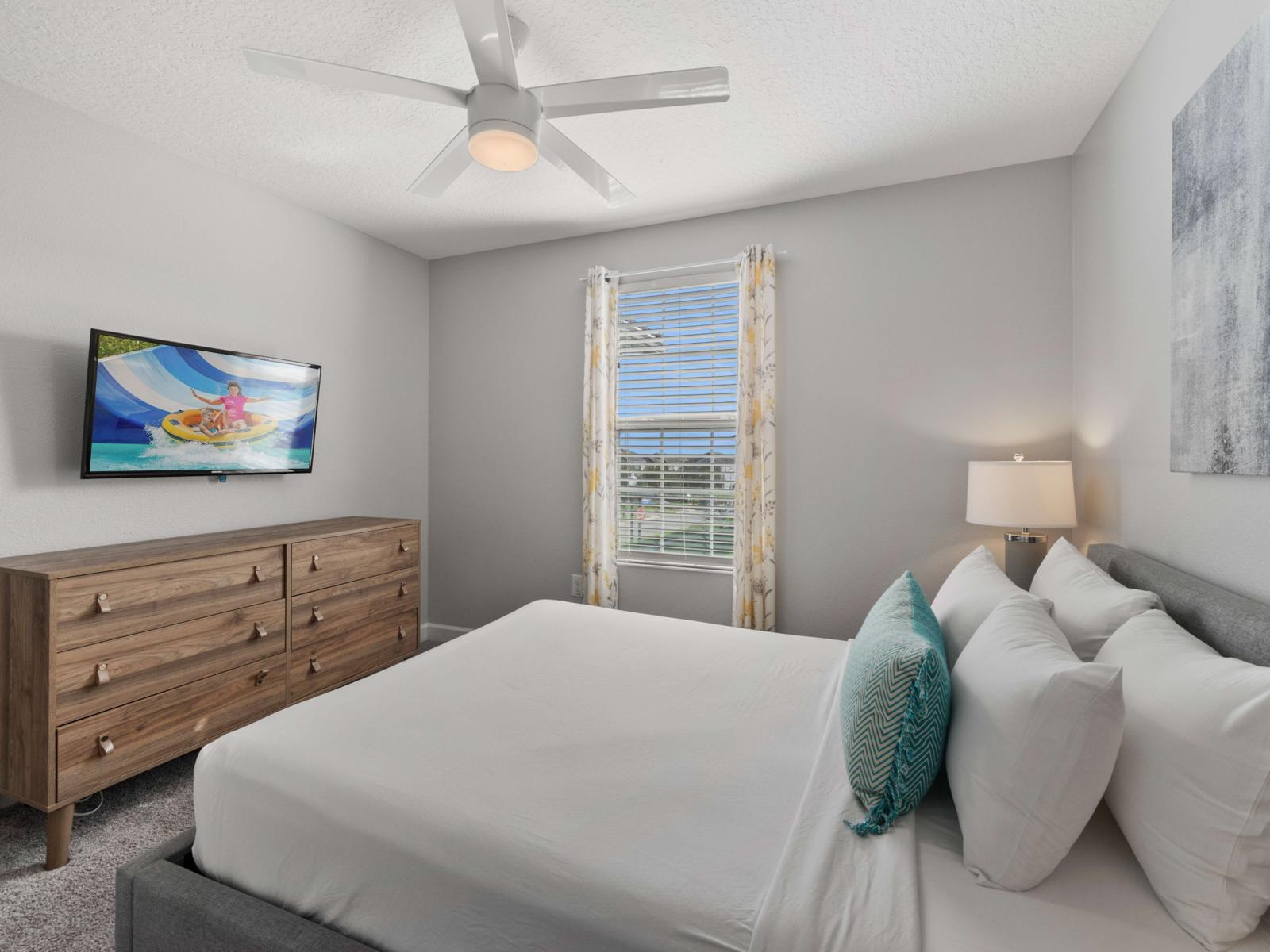 Guest Bedroom:  Enjoy this inviting guest bedroom with soft linens, bedside lighting, and stylish accents for a restful, private escape.