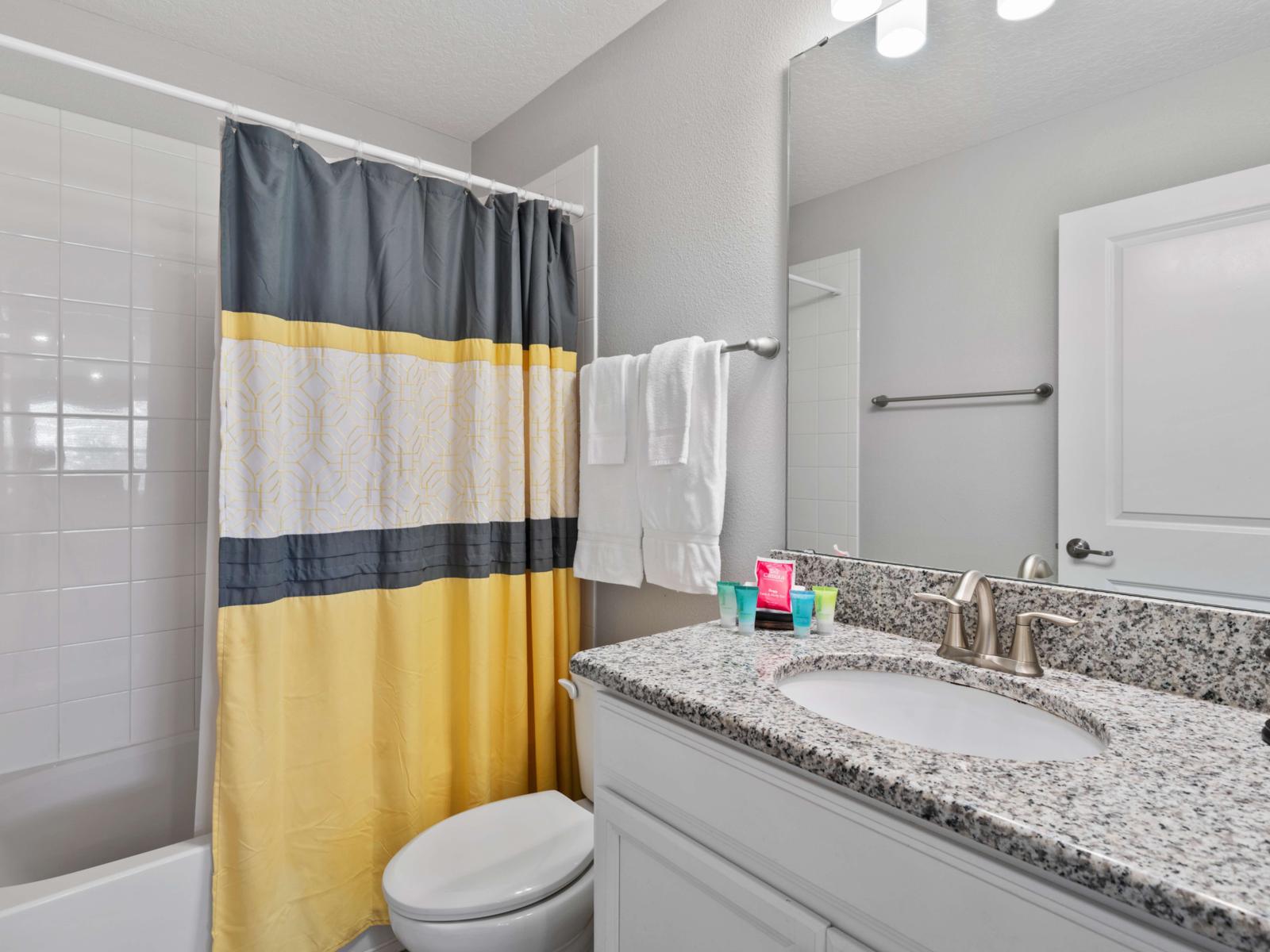 Bathroom Amenities:  Each bathroom in this spacious home includes walk-in showers, fresh towels, and thoughtful amenities to enhance your stay experience.