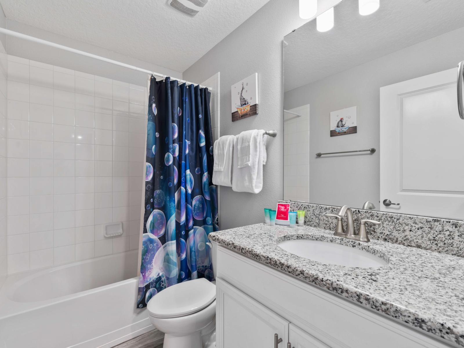 Bathroom Amenities:  Each bathroom in this spacious home includes walk-in showers, fresh towels, and thoughtful amenities to enhance your stay experience.