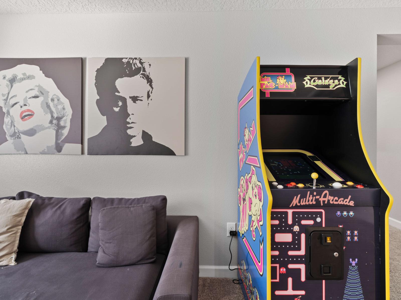 Loft Living Area (Arcade Feature):  Step up to the loft living area, featuring a retro arcade machine for endless fun—perfect for entertaining guests of all ages!