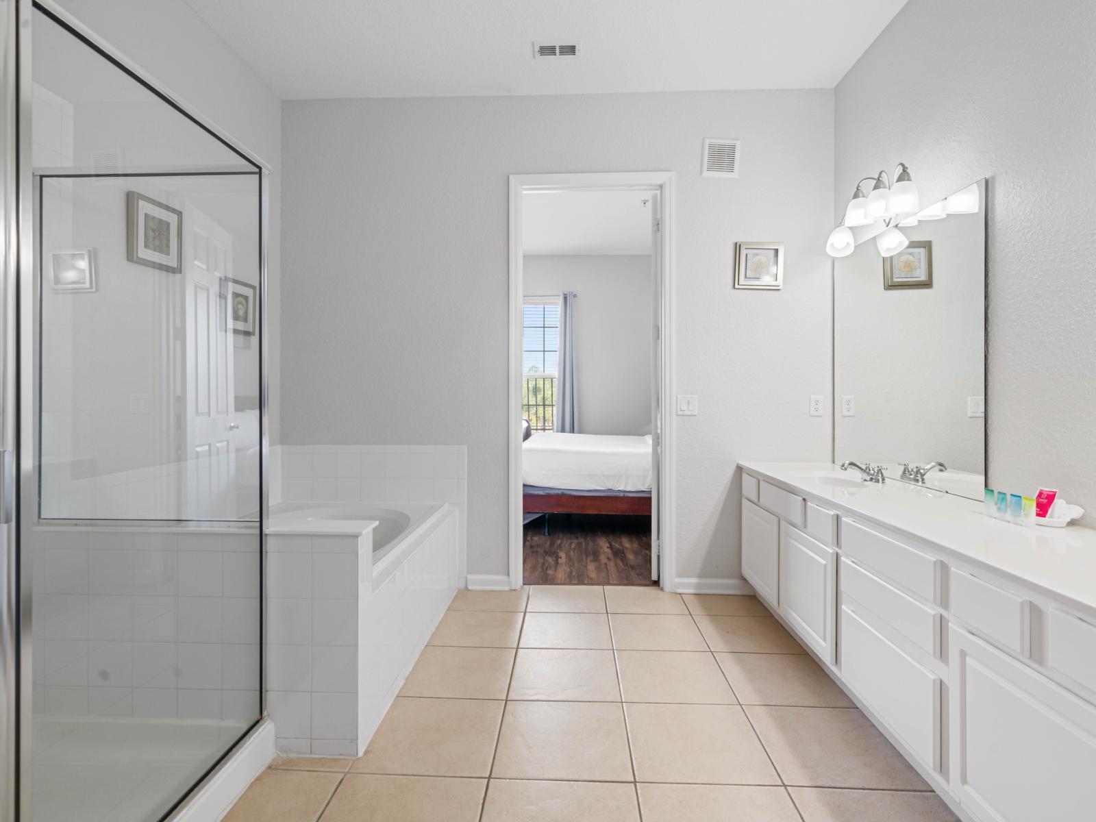 - Spa-like experience in a spacious bathroom featuring a glass shower and soaking tub - Dual sinks and plenty of counter space make it ideal for couples or families - Bright and modern, this space is designed to help you unwind and recharge