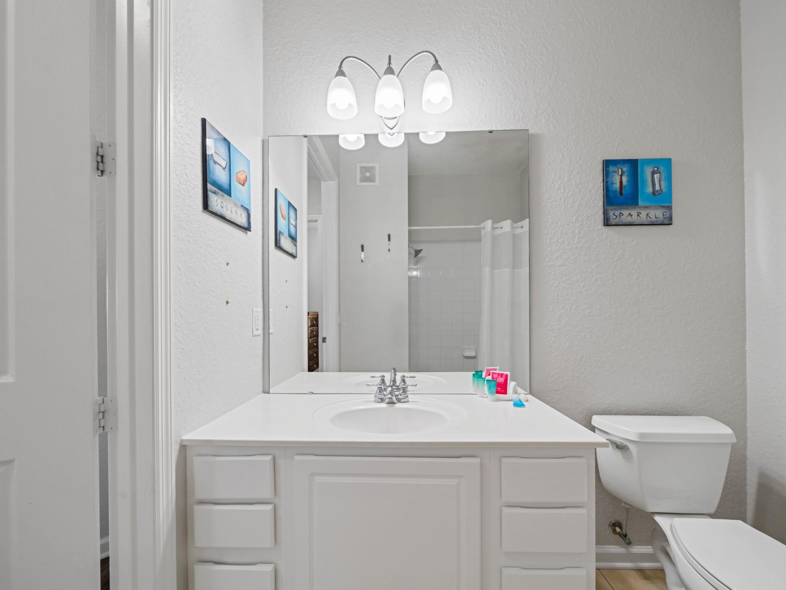 - Start your day fresh in this well-lit bathroom with a large mirror and plenty of counter space - Spotless and equipped with all the essentials for a stress-free stay - Thoughtful touches, like wall art and clean design, make it feel like home