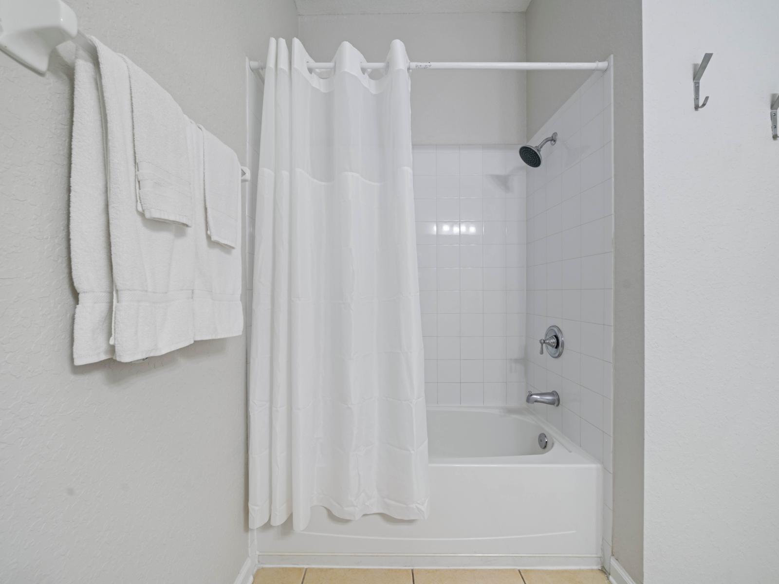 - Refresh and relax in a sparkling clean shower and tub combination - Soft, fresh towels are provided for your convenience and comfort - Minimalist design and thoughtful amenities create a welcoming experience