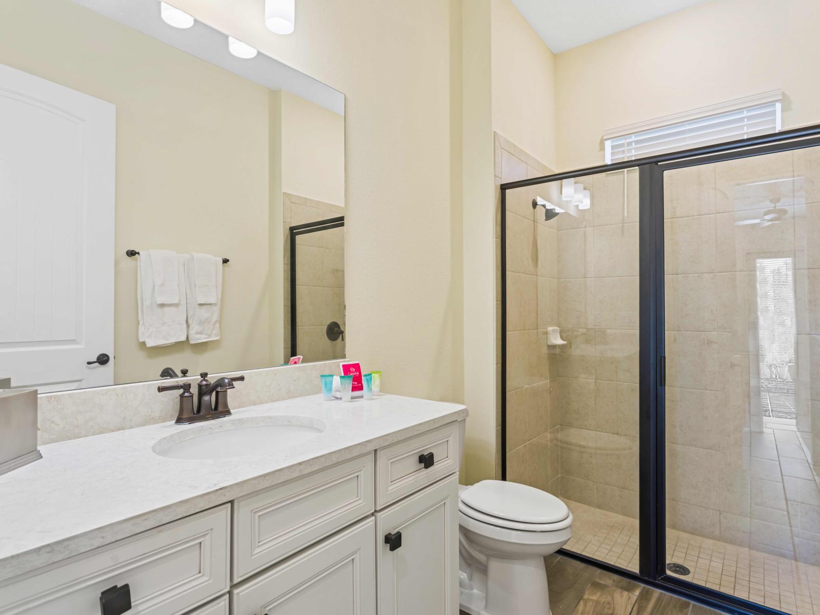 Bathroom 1 with a walk-in shower