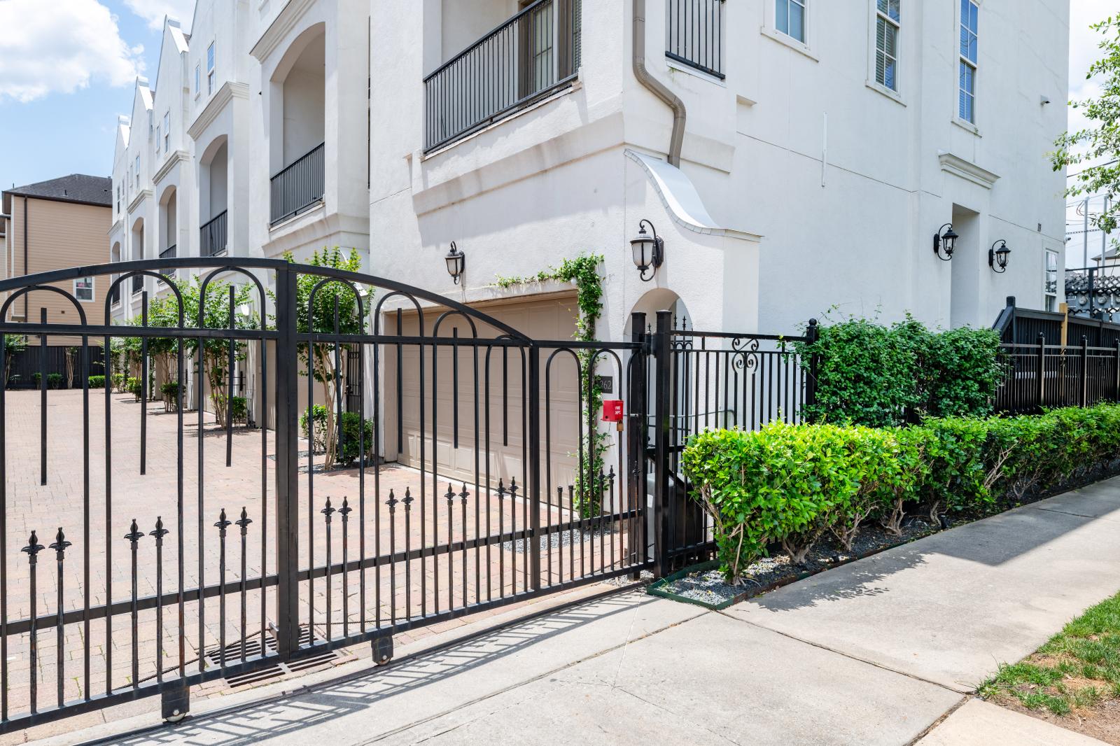 Gated entry to townhome community.