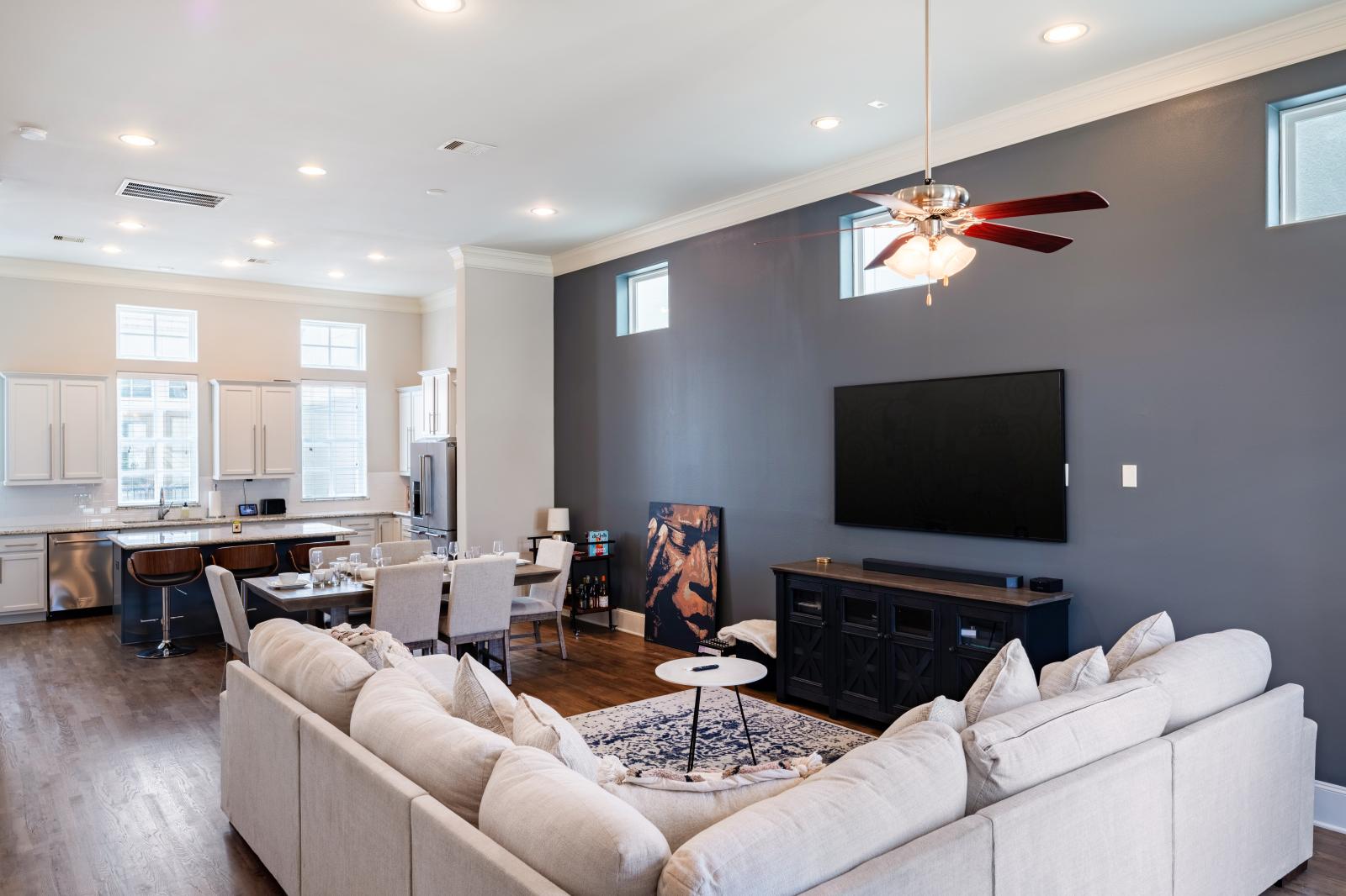 Chic decor featuring a 75" Smart TV. Ideal for movie nights or catching up after a day of exploring.