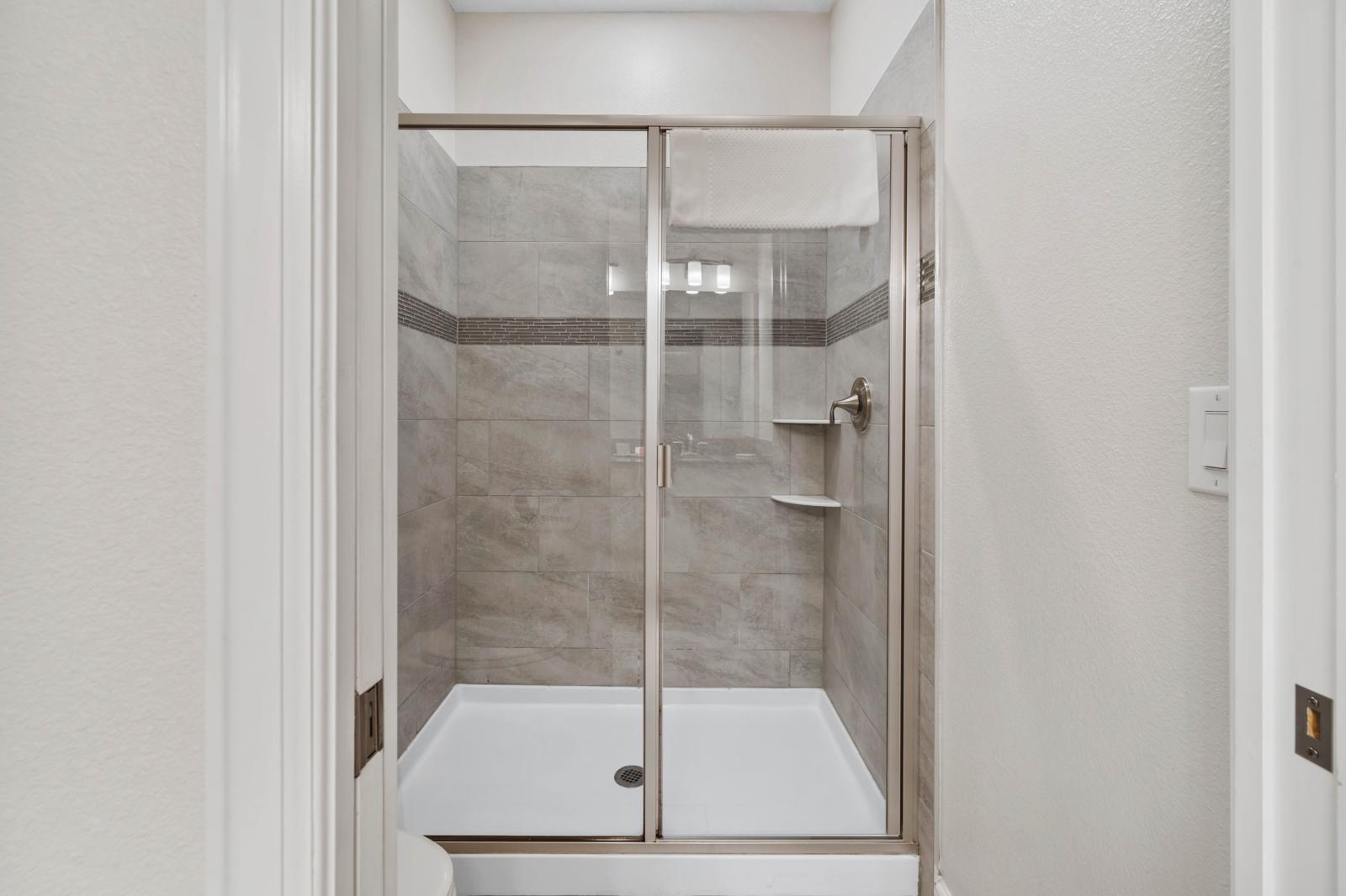 Bathroom 1 with a walk-in shower