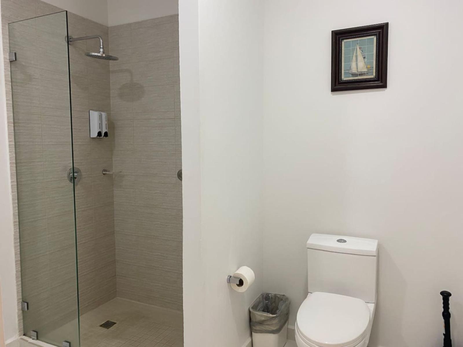 Bathroom offers a walk in shower