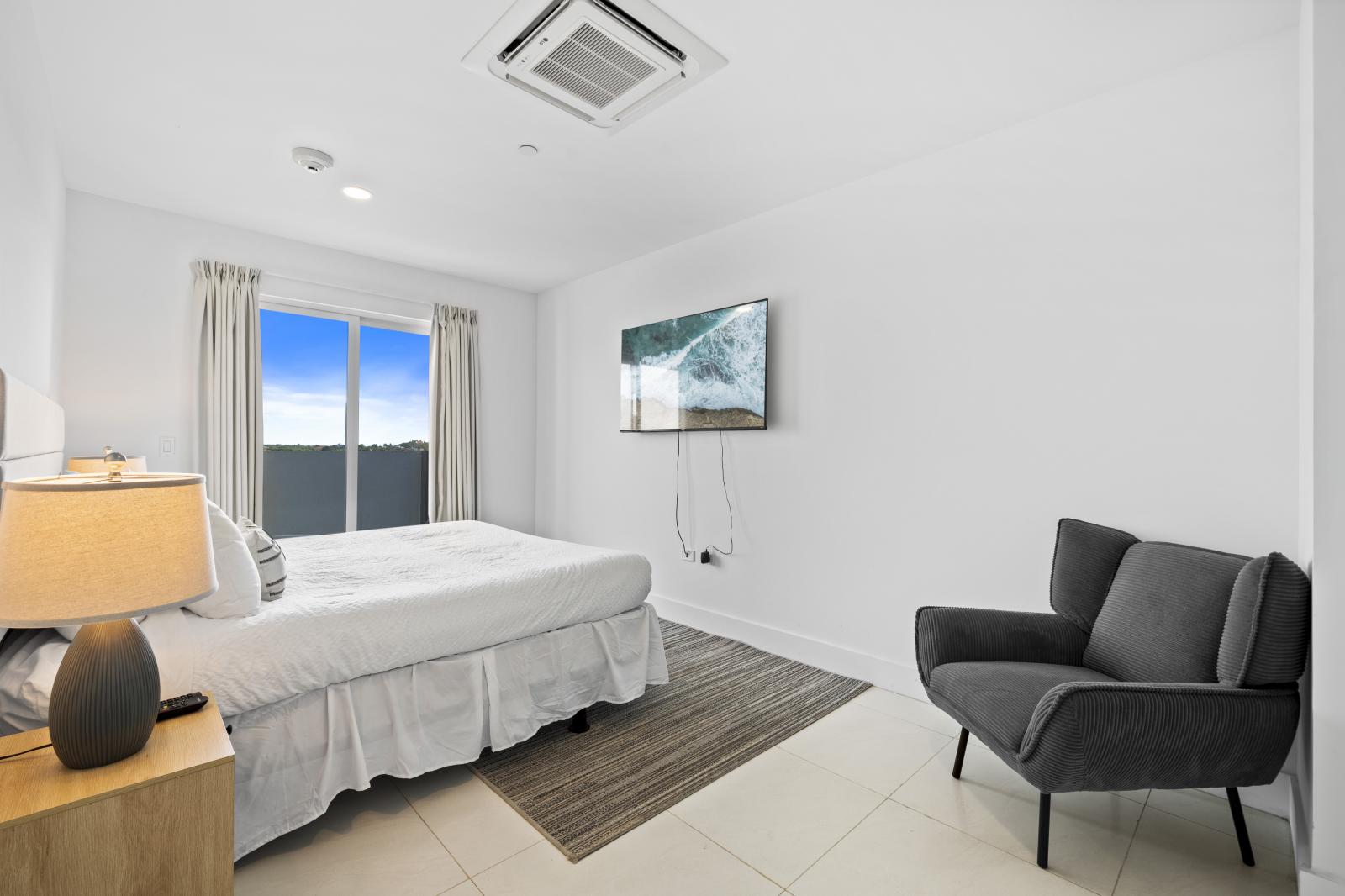 The bedroom has a smart TV