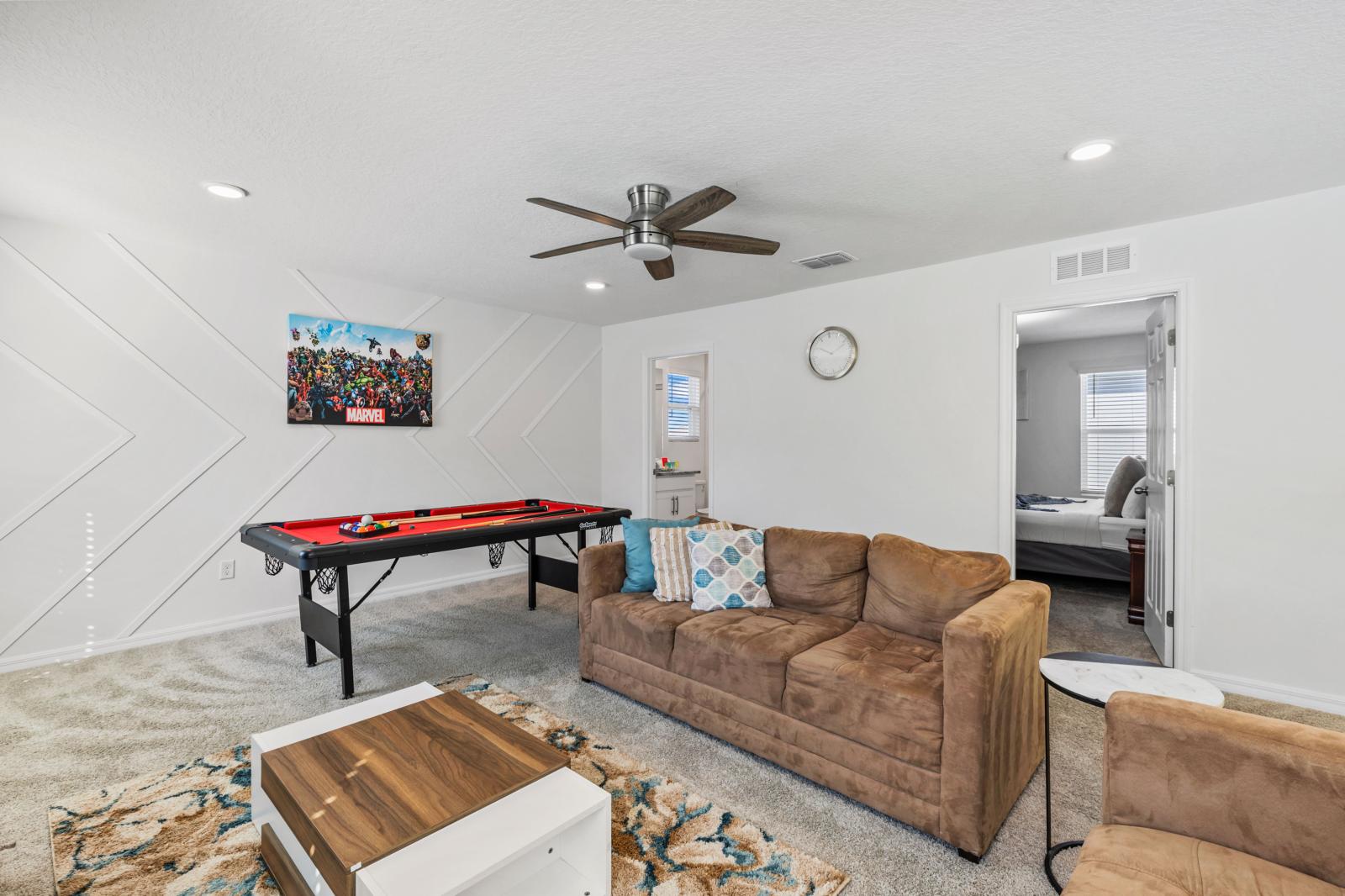 Loft area with a smart tv and  a pool table