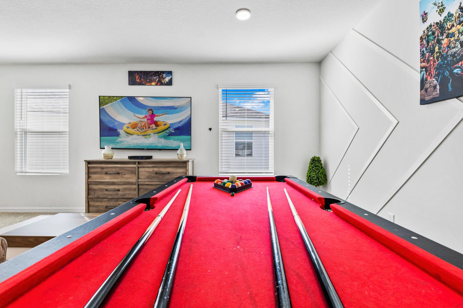 Loft area with a smart tv and  a pool table