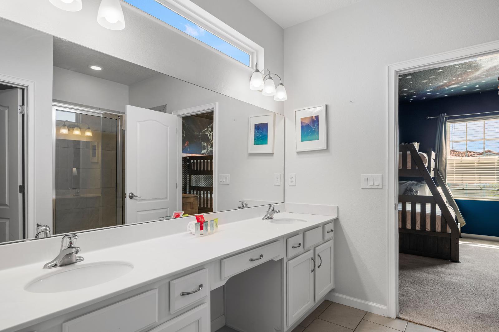 Bathroom 7 with a walk-in shower and a double sink