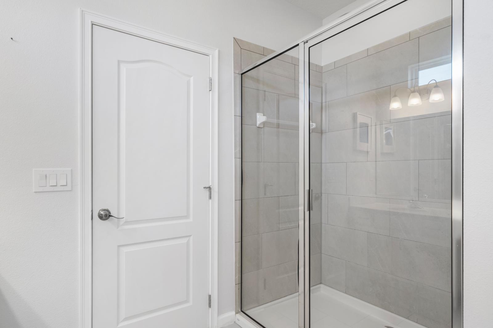 Bathroom 7 with a walk-in shower and a double sink