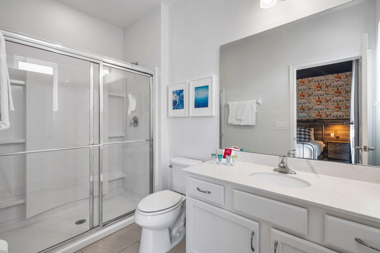 Bathroom 8 with a walk-in shower and a double sink