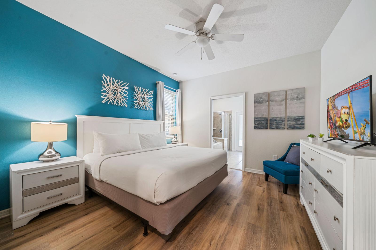 Bedroom 1 with a king size bed and a private bathroom
