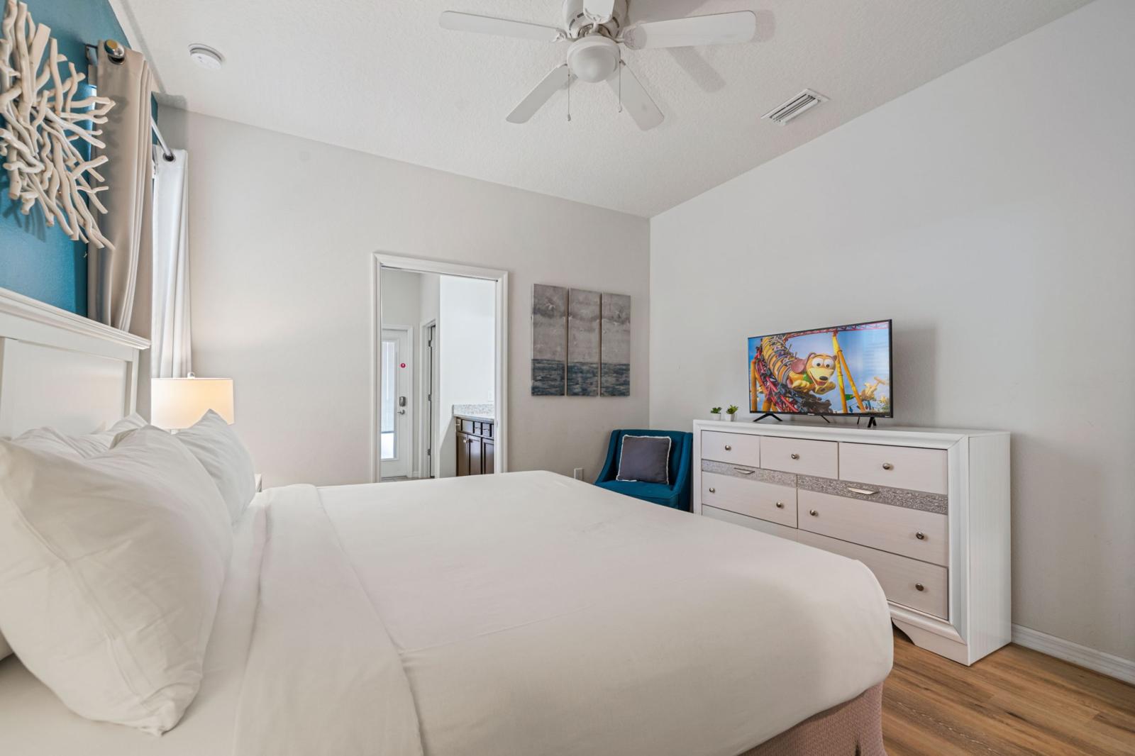 Bedroom 1 with a king size bed and a private bathroom