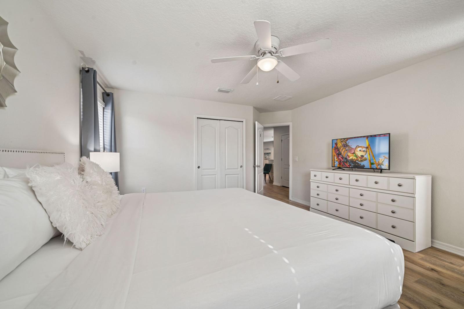 Bedroom 2 with a king size bed and a private bathroom