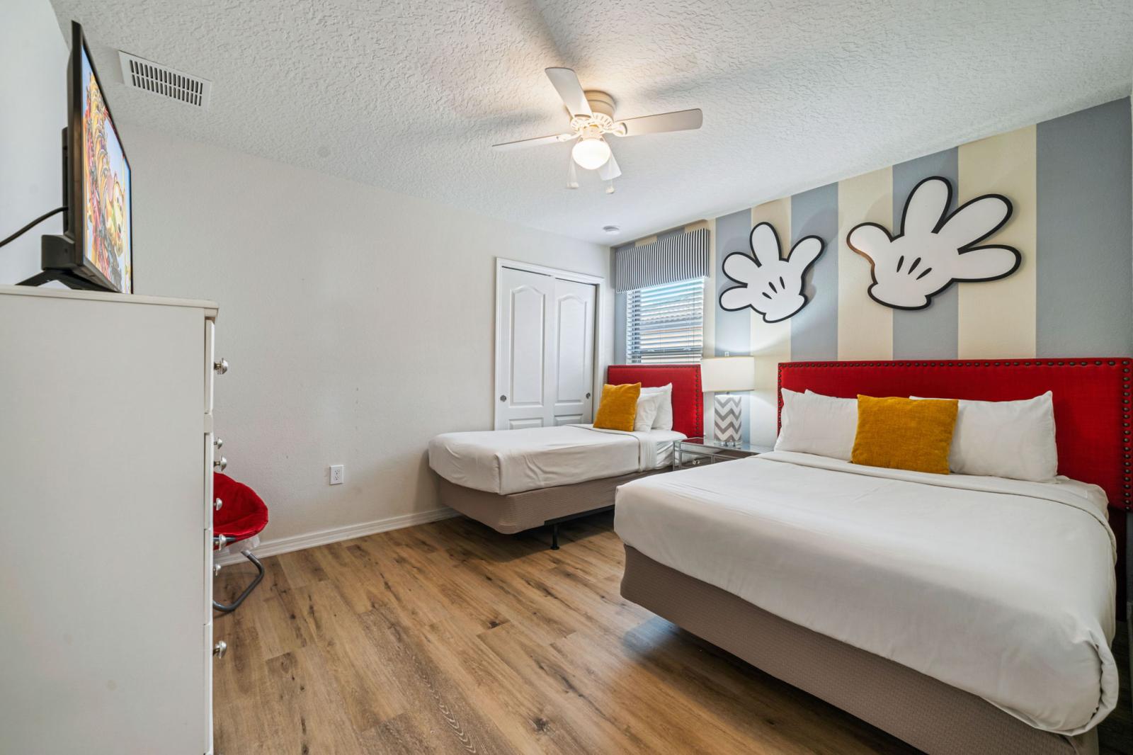 Bedroom 3 with a double bed and a single bed Mickey Mouse theme room