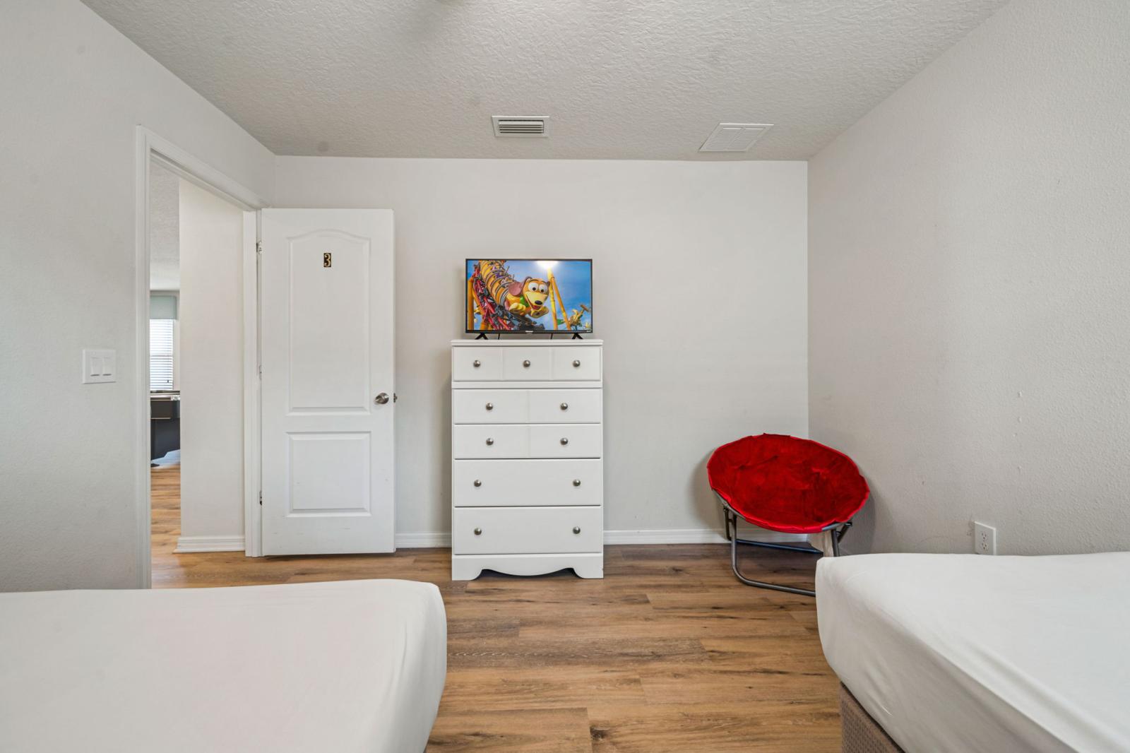 Bedroom 3 with a double bed and a single bed Mickey Mouse theme room