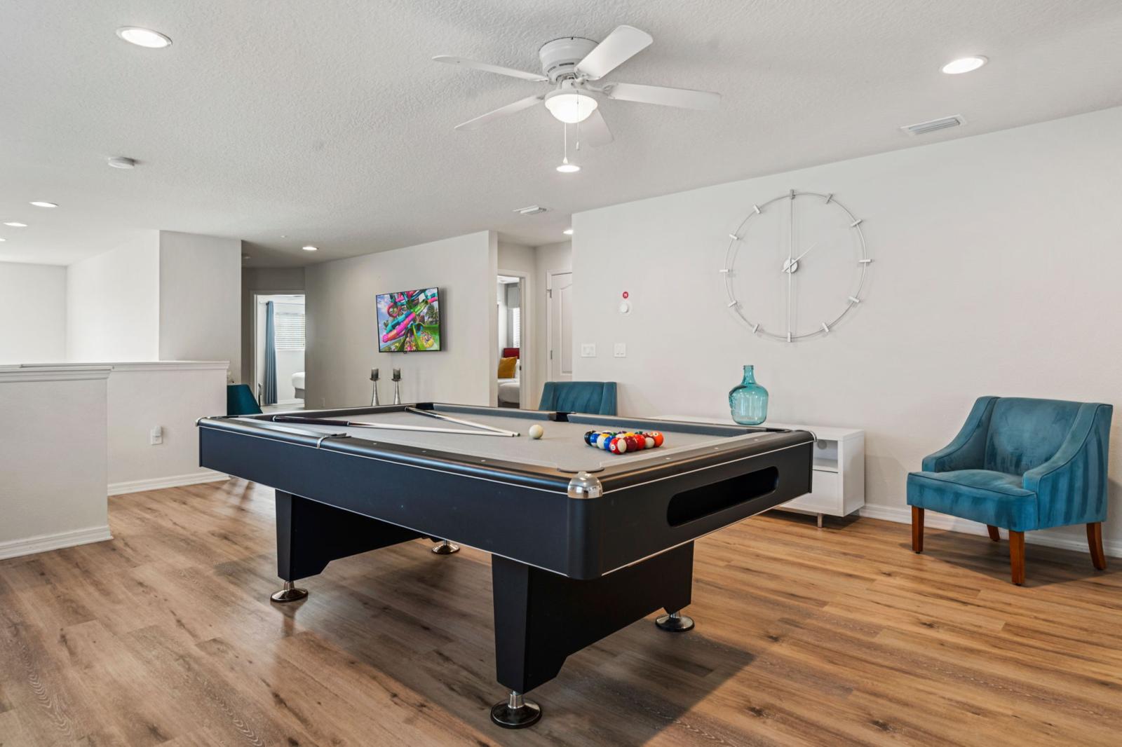 Loft area with a pool table