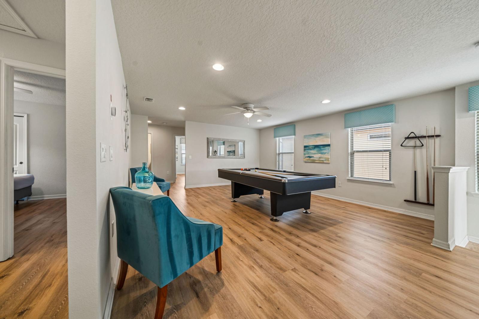 Loft area with a pool table
