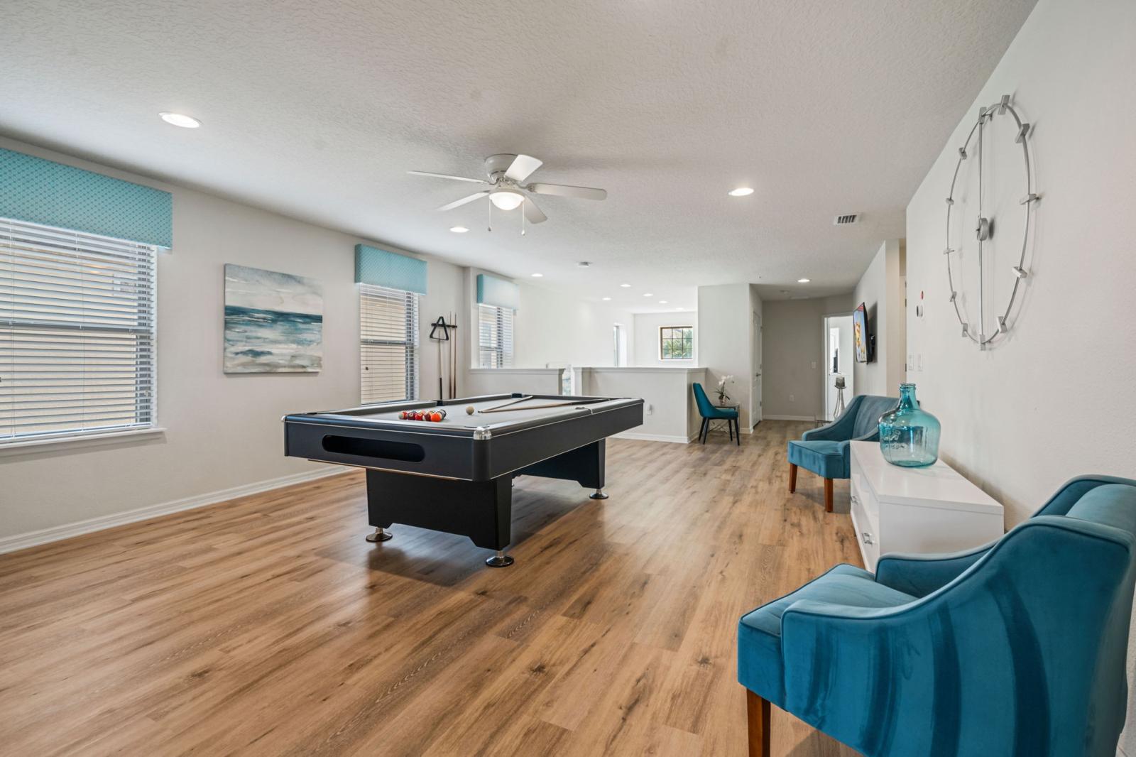Loft area with a pool table