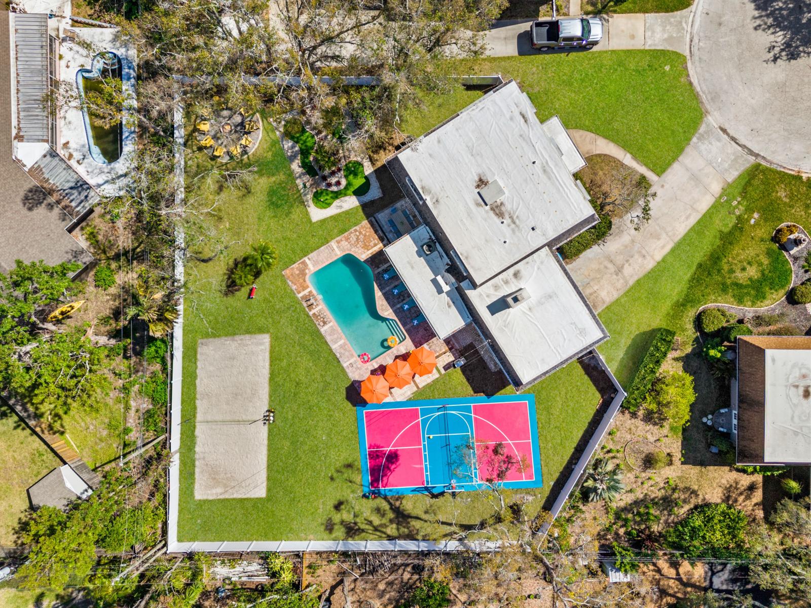 Pool, BBQ, pickleball, basketball, beach volleyball, mini-golf, game room, kids play room and a cozy fire pit—all just under 7 miles from Clearwater Beach!