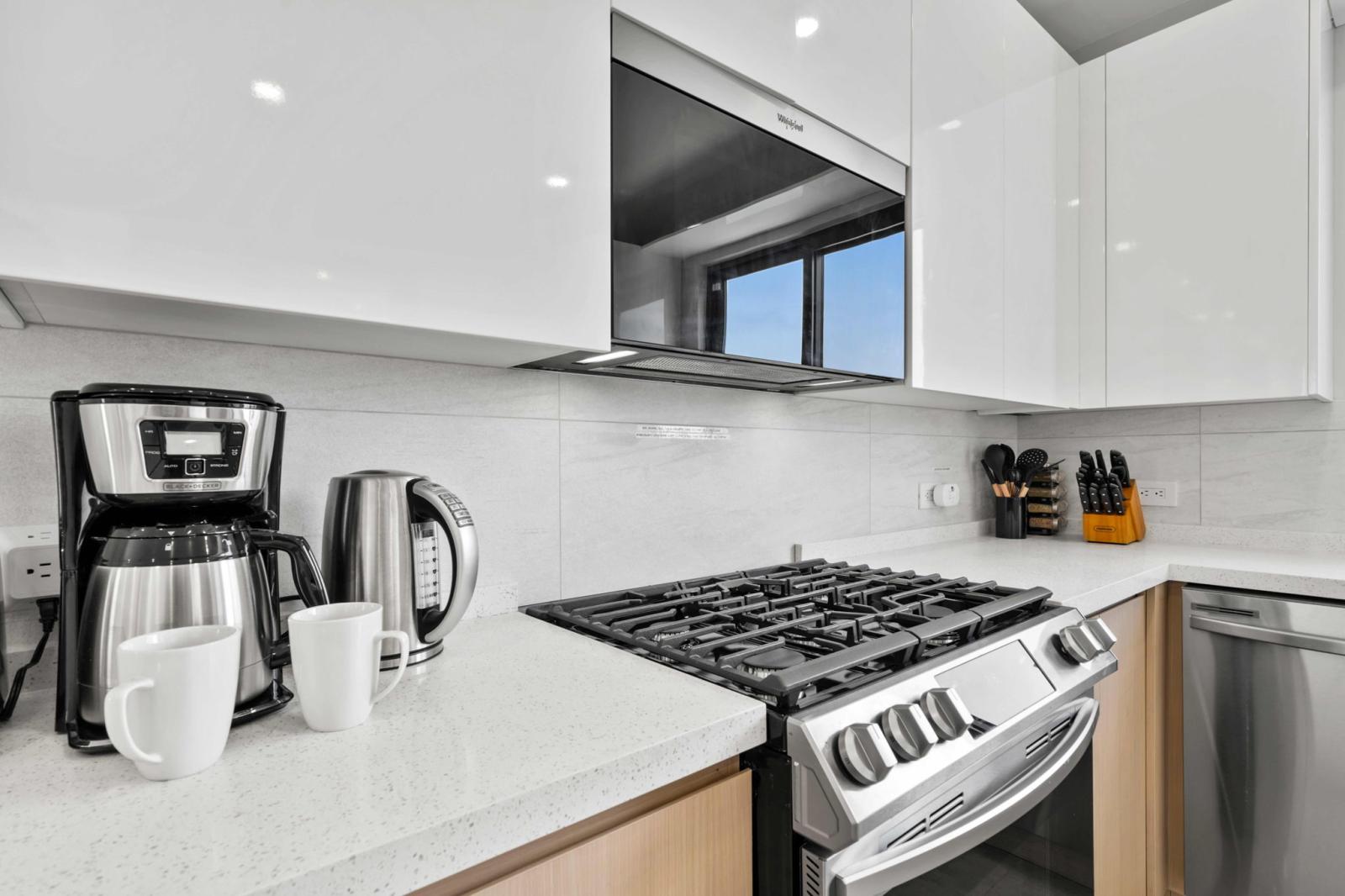 Start your day with fresh coffee or tea, with all essentials ready in the modern kitchen - Stainless steel appliances, gas stove & sleek countertops make meal prep effortless - Designed for convenience, whether you’re cooking a meal or a quick bite